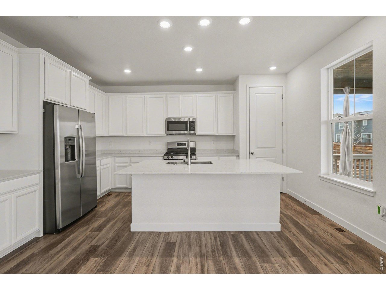 5258 Inland Avenue Firestone, CO 80504 - Photo 10 of 44 View of Kitchen from Dining Area