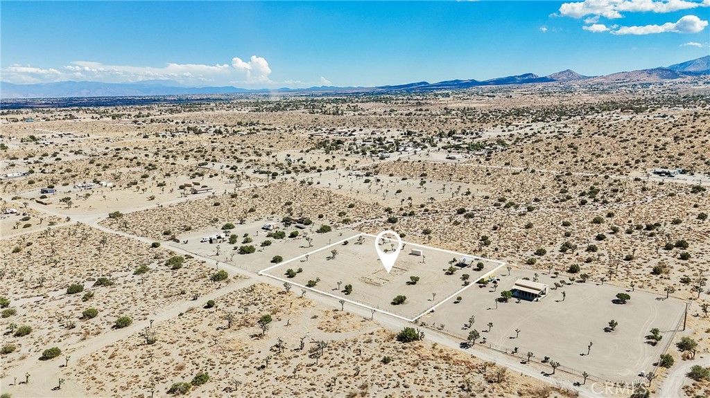 3375 Solano Road Phelan, CA 92371 - Photo 1 of 1 a view of a road with an outdoor space