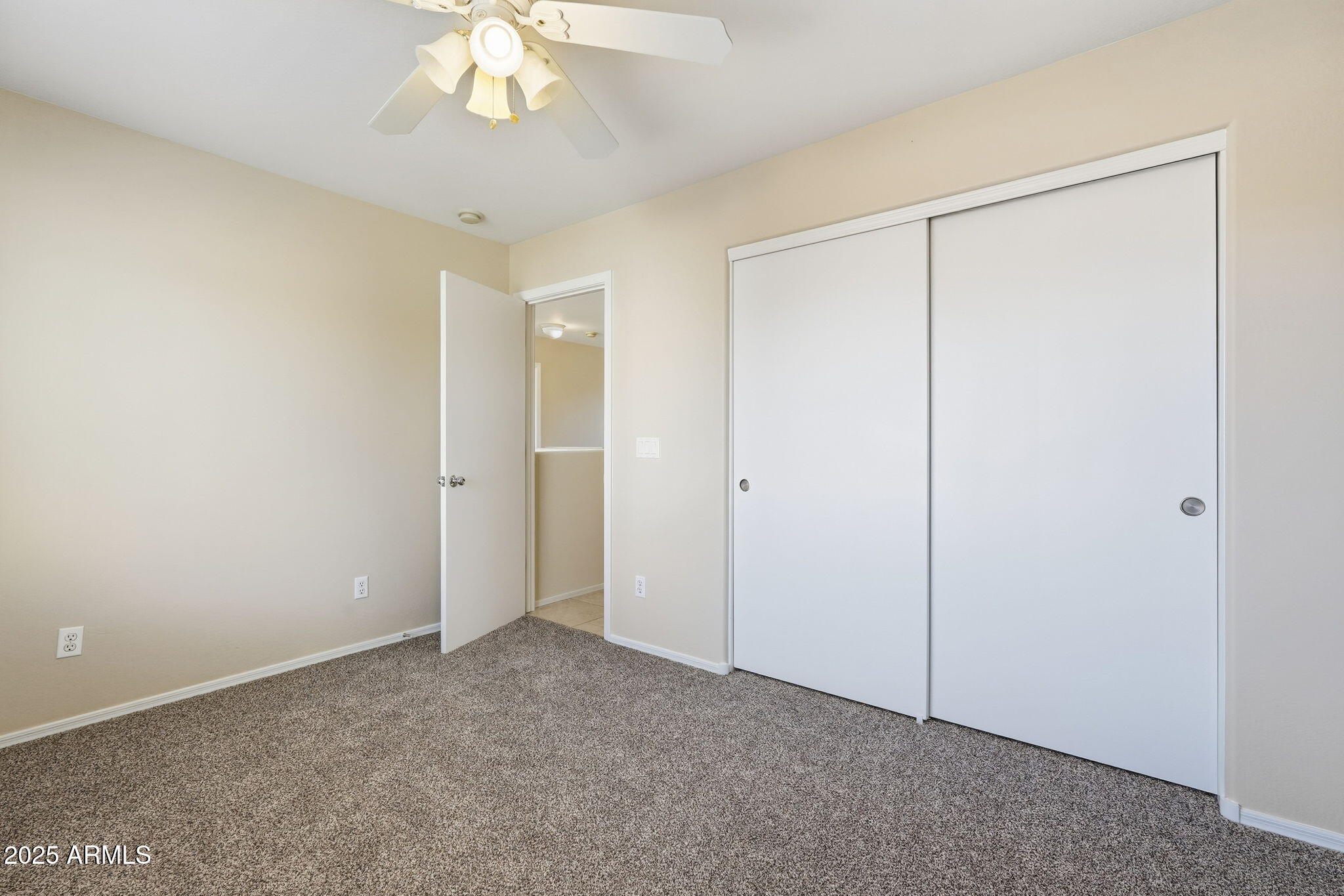 2691 South Chaparral Road Apache Junction, AZ 85119 - Photo 22 of 43 a view of an empty room with a chandelier fan