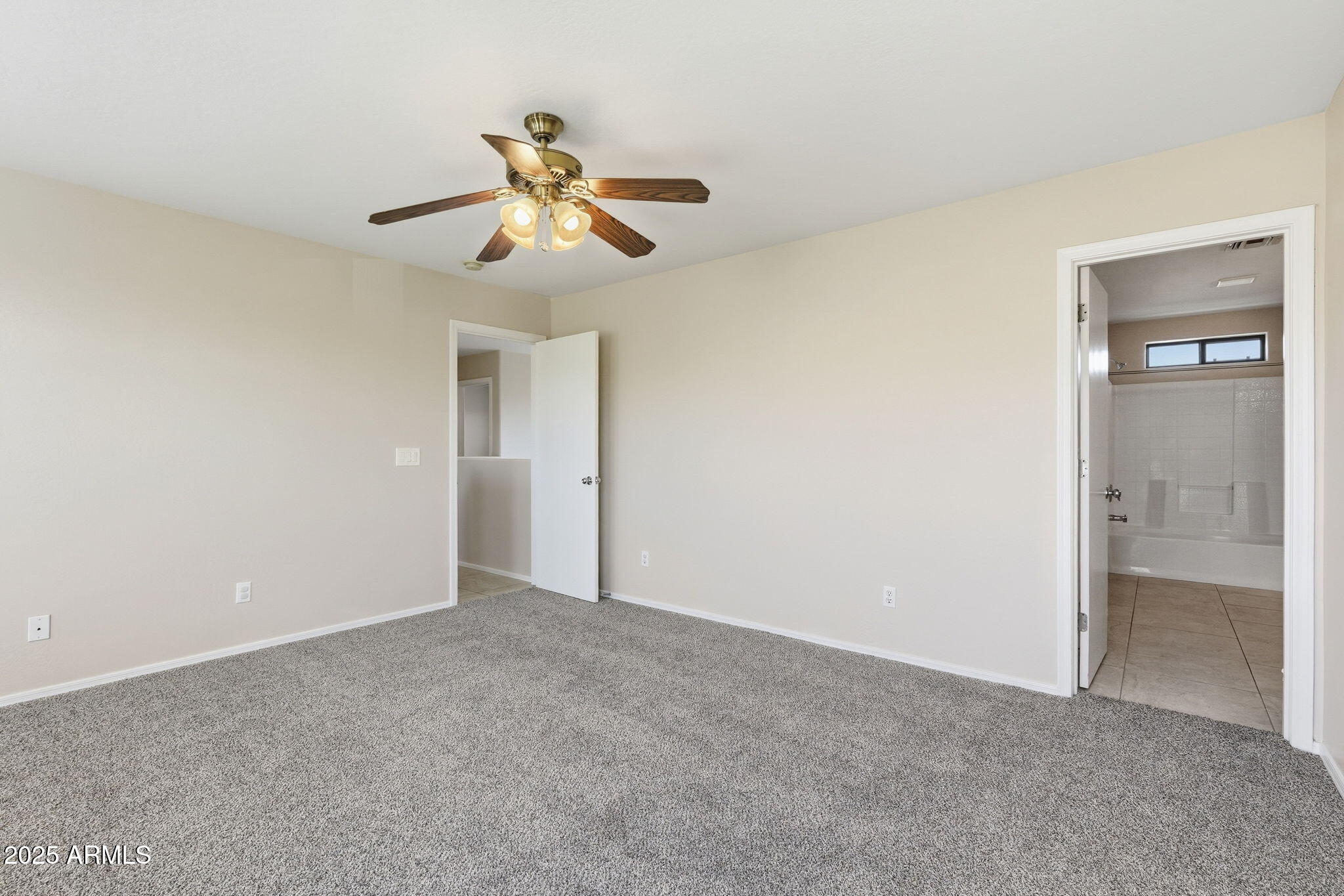 2691 South Chaparral Road Apache Junction, AZ 85119 - Photo 27 of 43 a view of an empty room and window