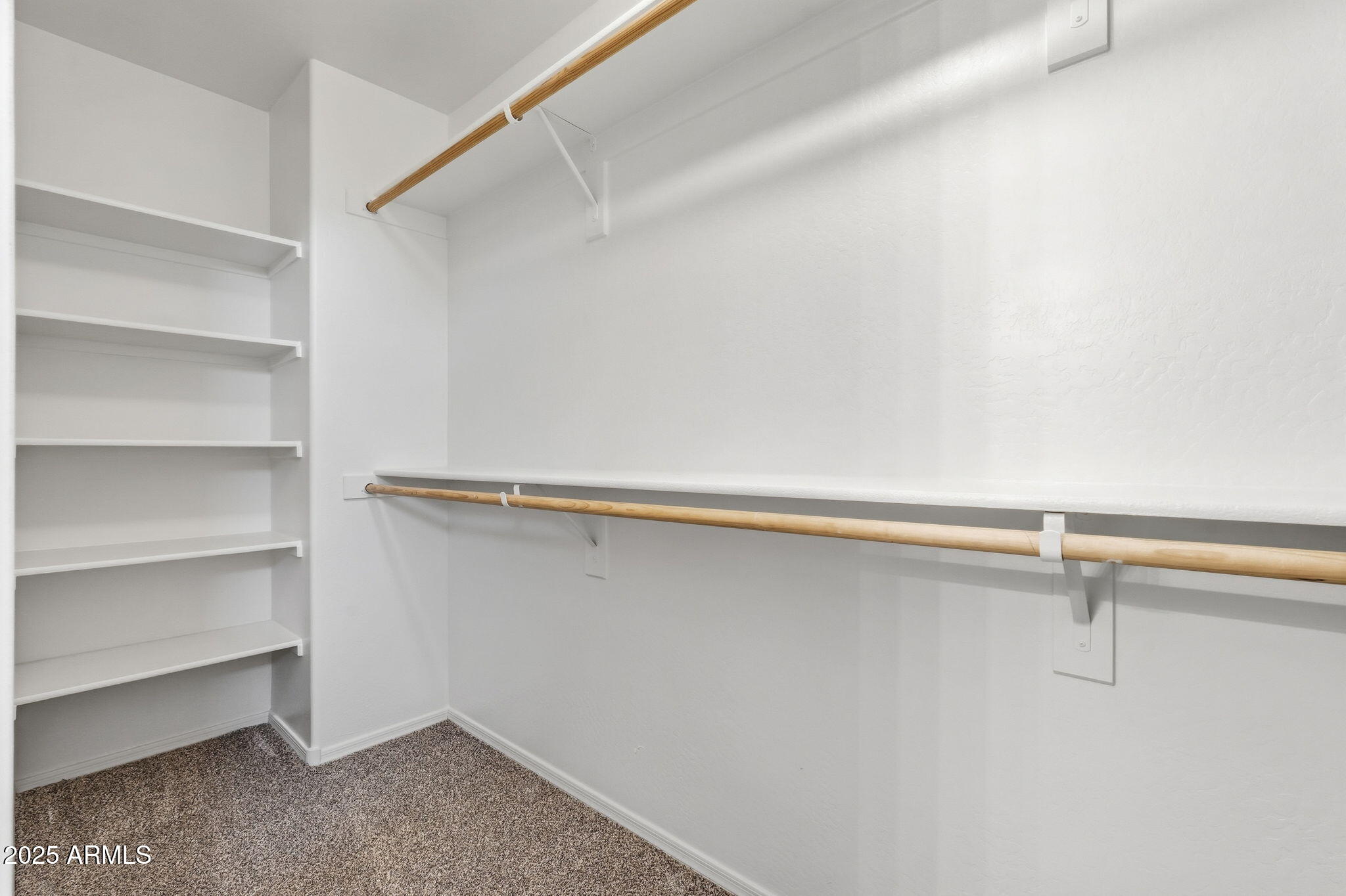 2691 South Chaparral Road Apache Junction, AZ 85119 - Photo 28 of 43 a view of a room with shelf on the wall