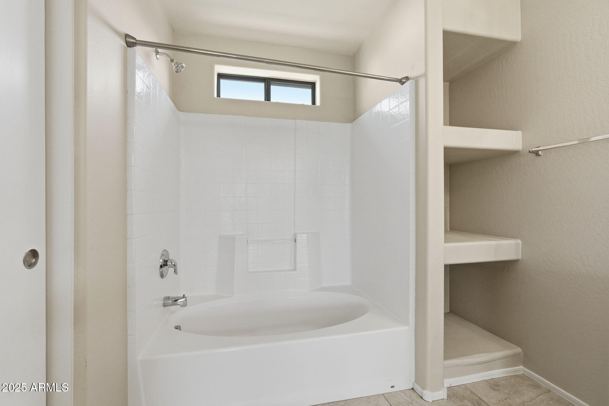 2691 South Chaparral Road Apache Junction, AZ 85119 - Photo 32 of 43 a bathroom with a bathtub