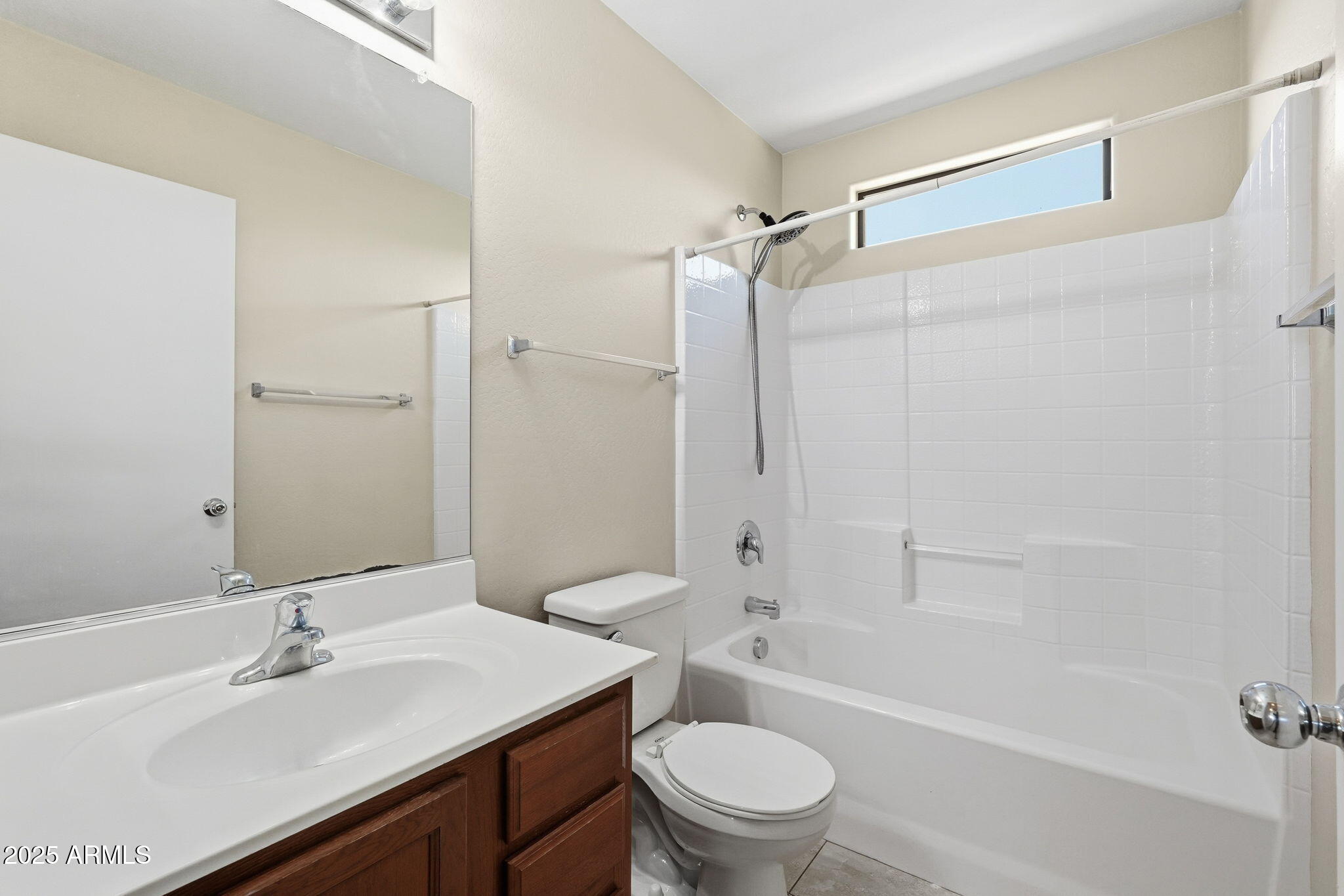 2691 South Chaparral Road Apache Junction, AZ 85119 - Photo 33 of 43 a bathroom with a sink a toilet and shower