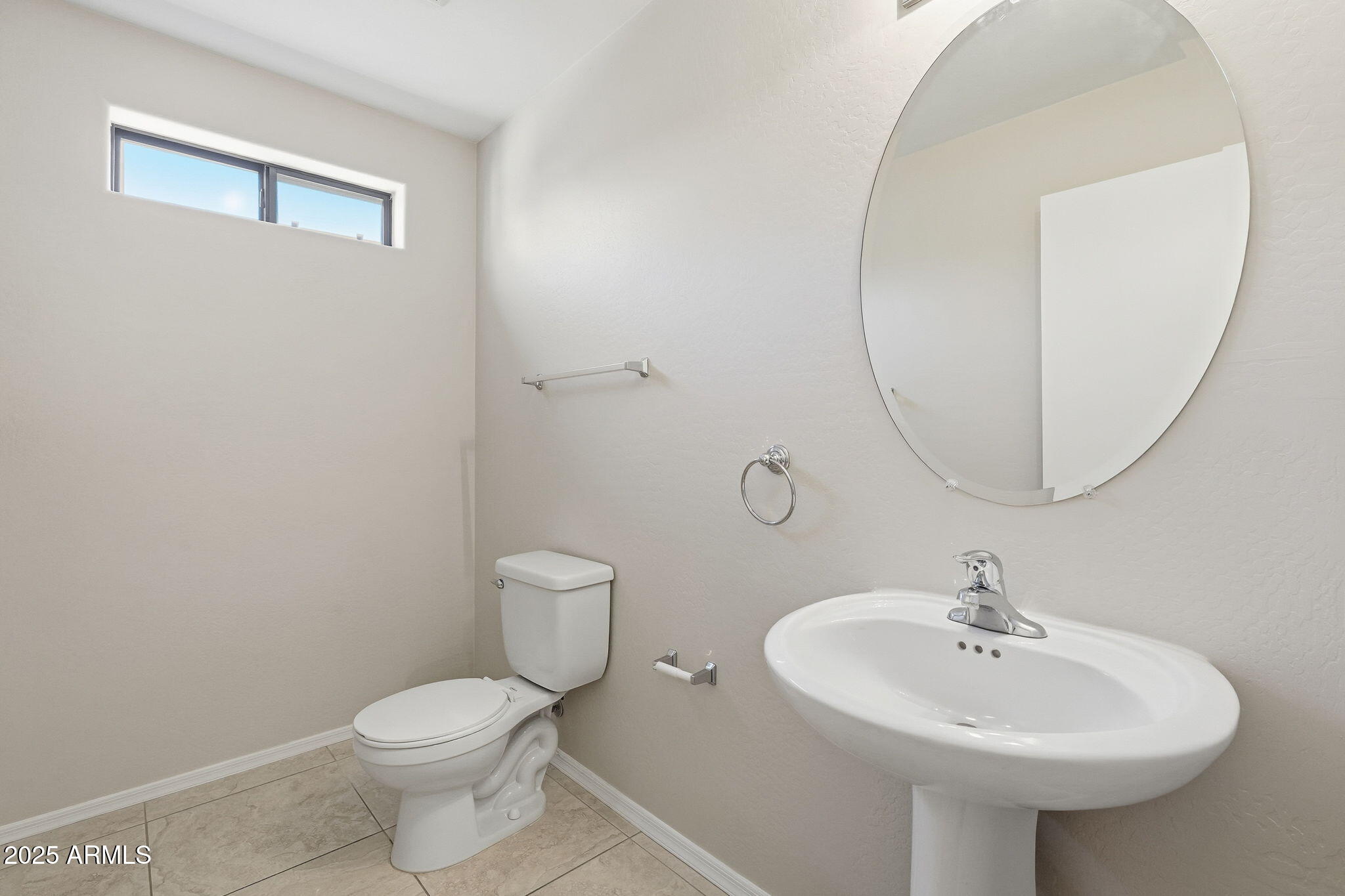 2691 South Chaparral Road Apache Junction, AZ 85119 - Photo 34 of 43 a bathroom with a sink a mirror and toilet