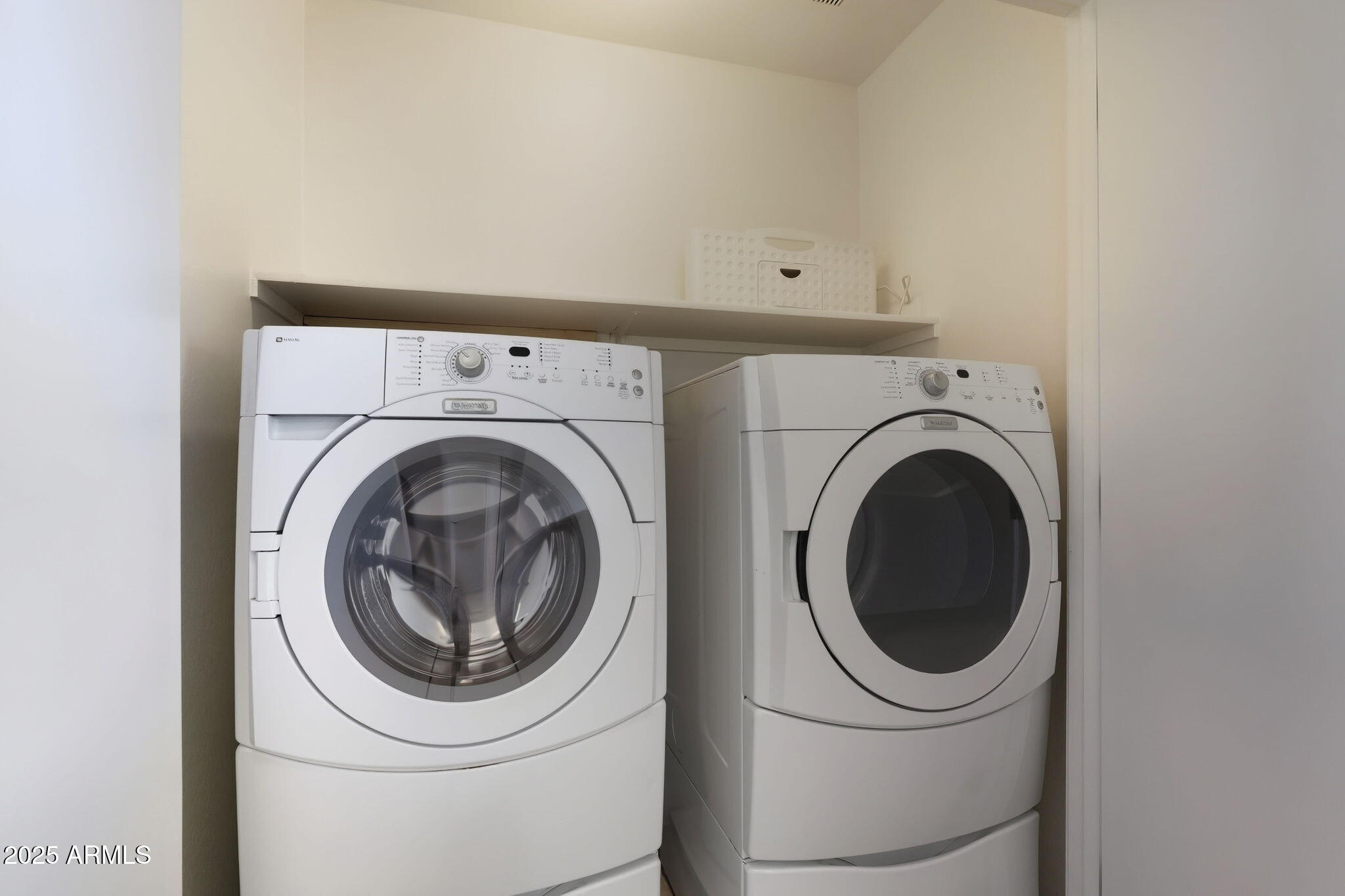 2691 South Chaparral Road Apache Junction, AZ 85119 - Photo 35 of 43 a utility room with dryer and washer