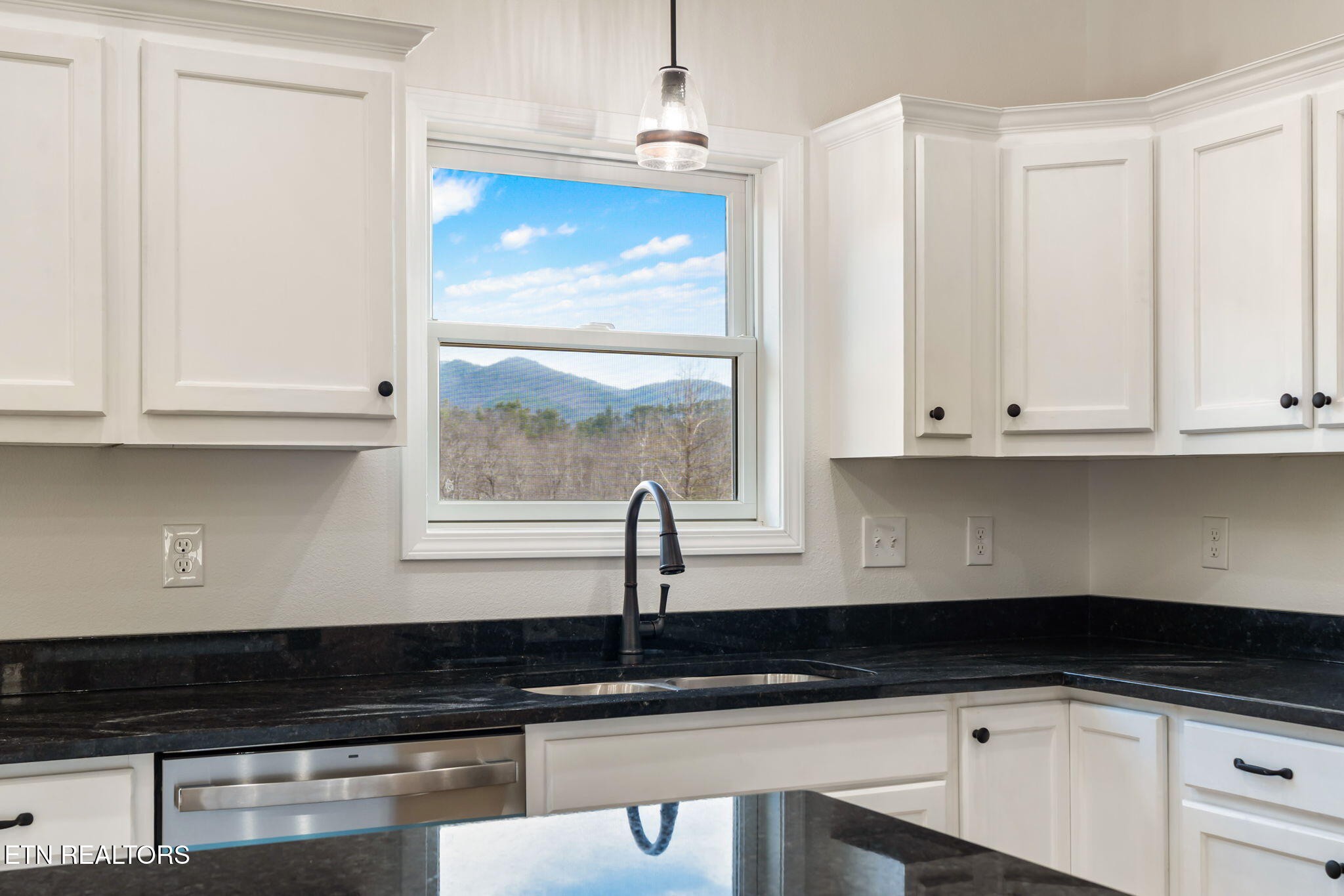 680 Kaylee Lane Del Rio, TN 37727 - Photo 13 of 41 a kitchen with granite countertop white cabinets and a sink