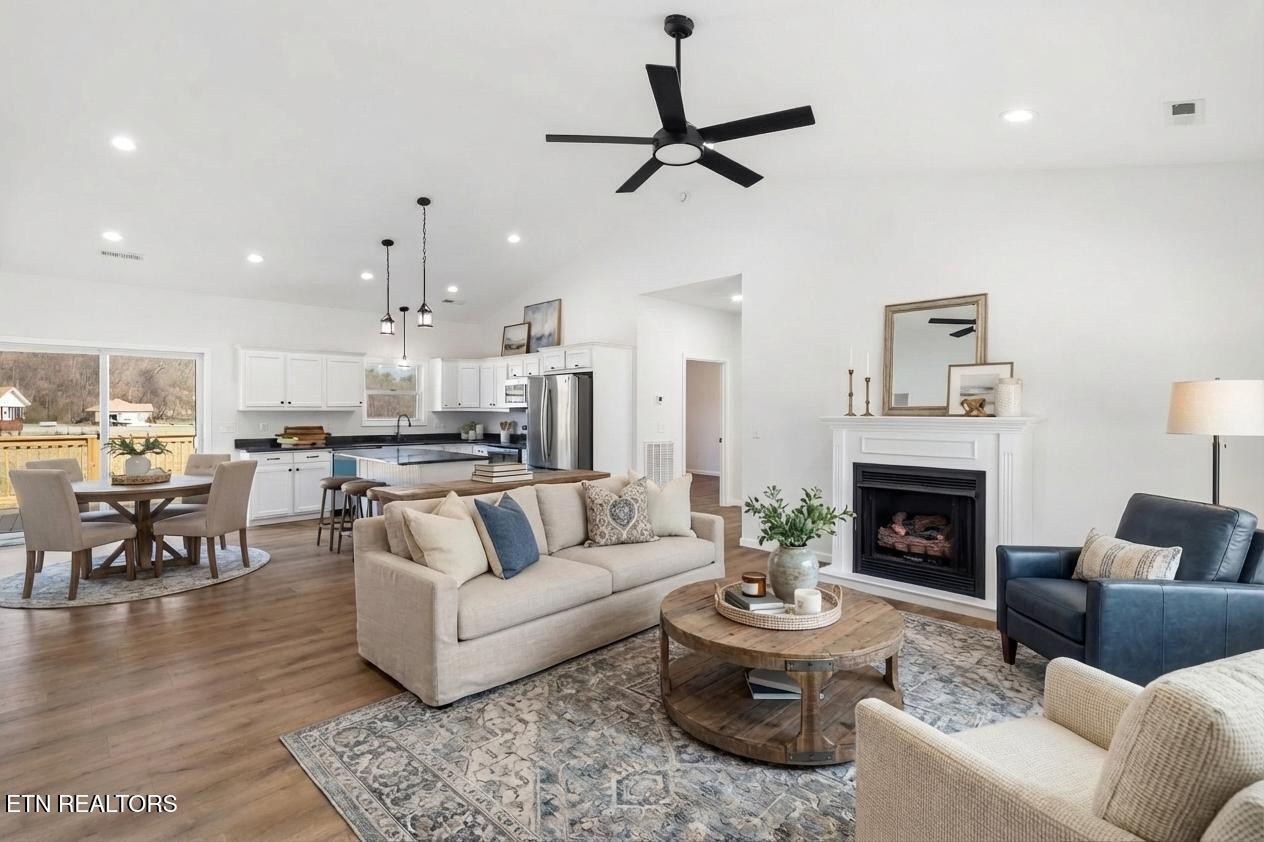 680 Kaylee Lane Del Rio, TN 37727 - Photo 2 of 41 a living room with furniture and a fireplace