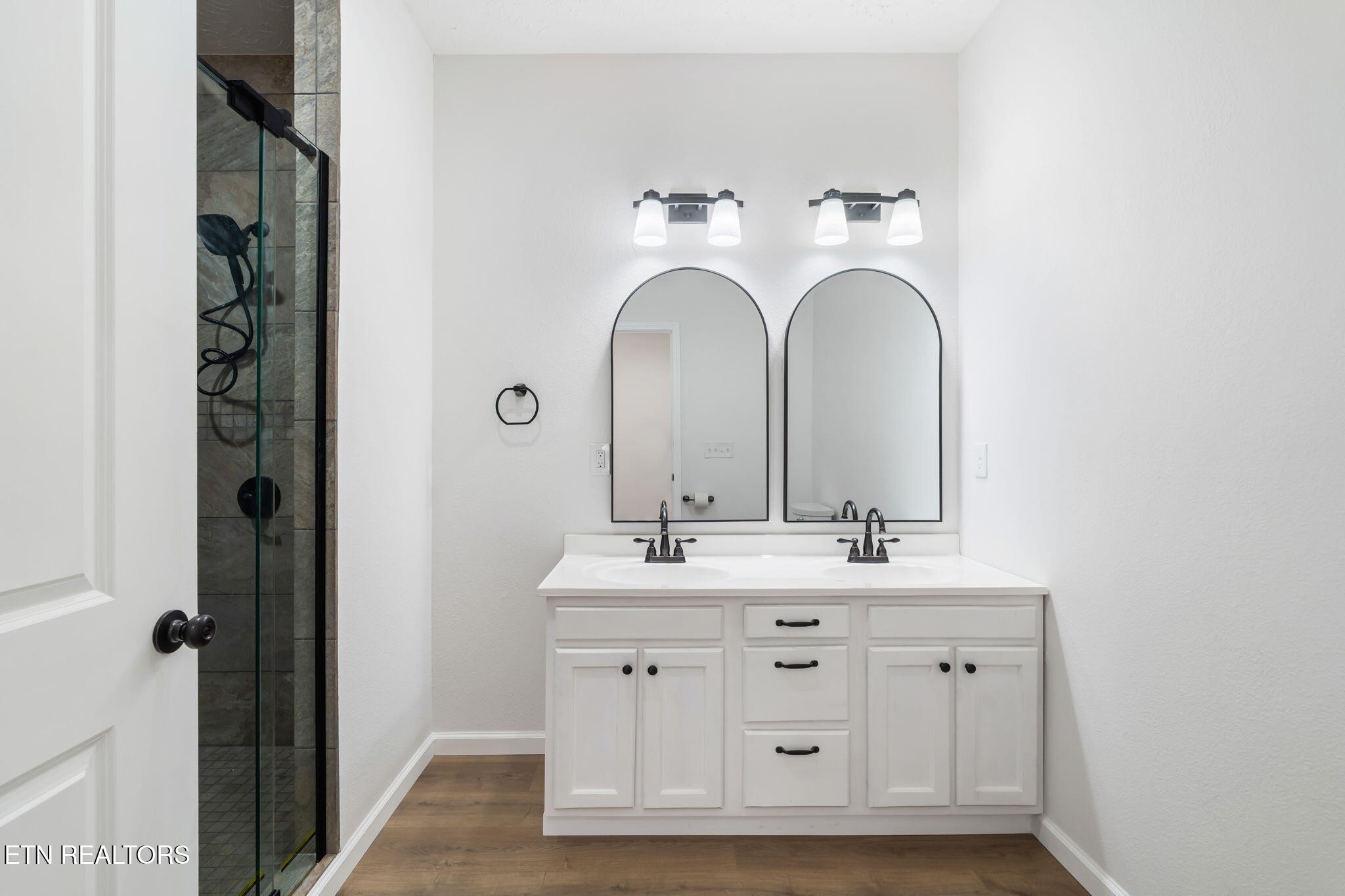 680 Kaylee Lane Del Rio, TN 37727 - Photo 22 of 41 a bathroom with a double vanity sink and mirror
