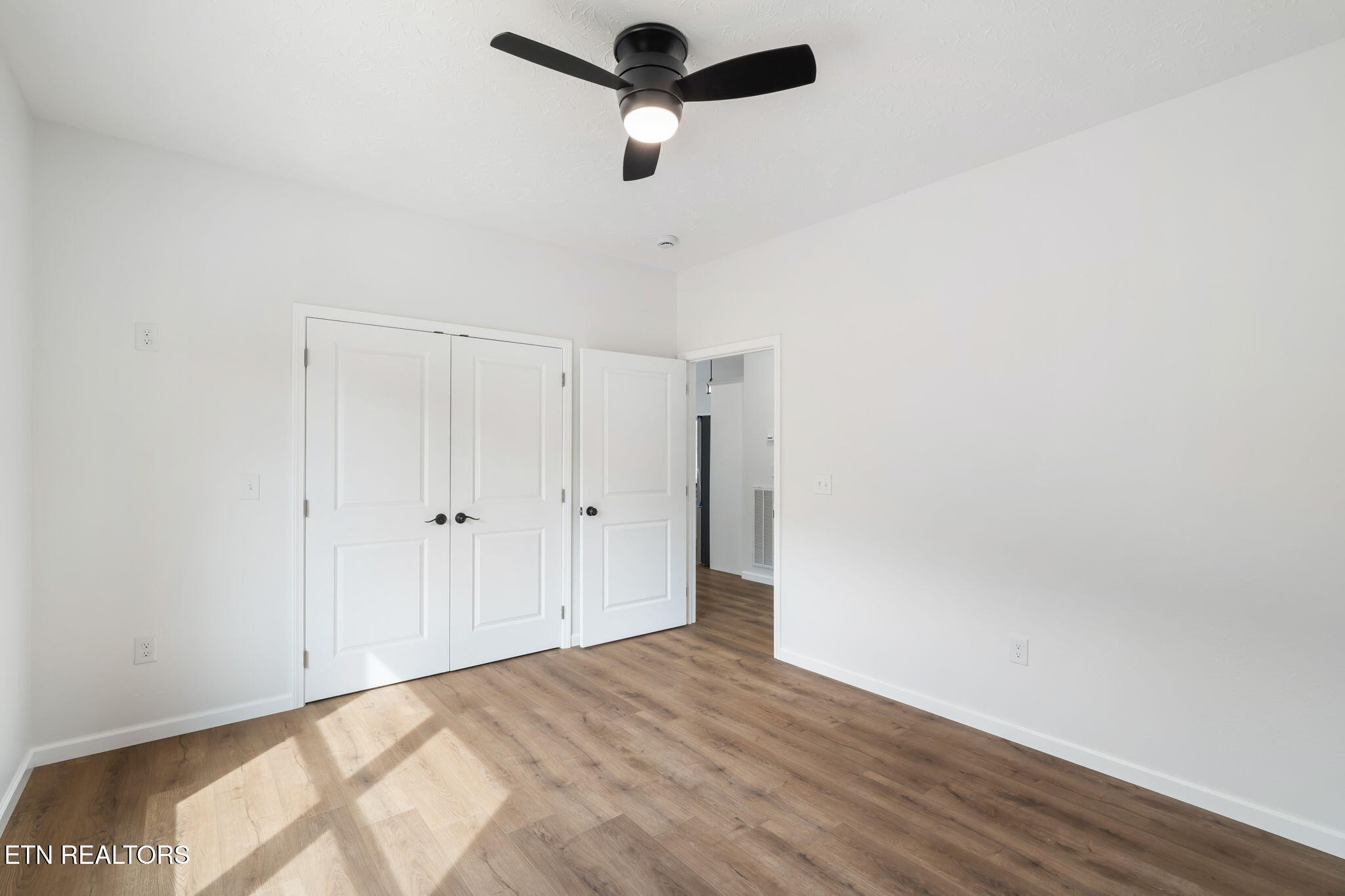 680 Kaylee Lane Del Rio, TN 37727 - Photo 27 of 41 a view of empty room with wooden floor