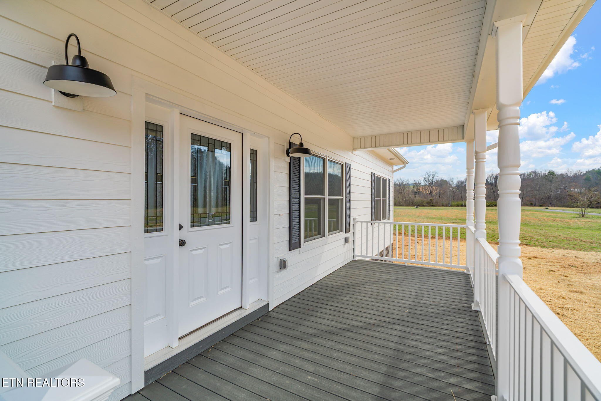 680 Kaylee Lane Del Rio, TN 37727 - Photo 8 of 41 a view of a balcony with wooden floor