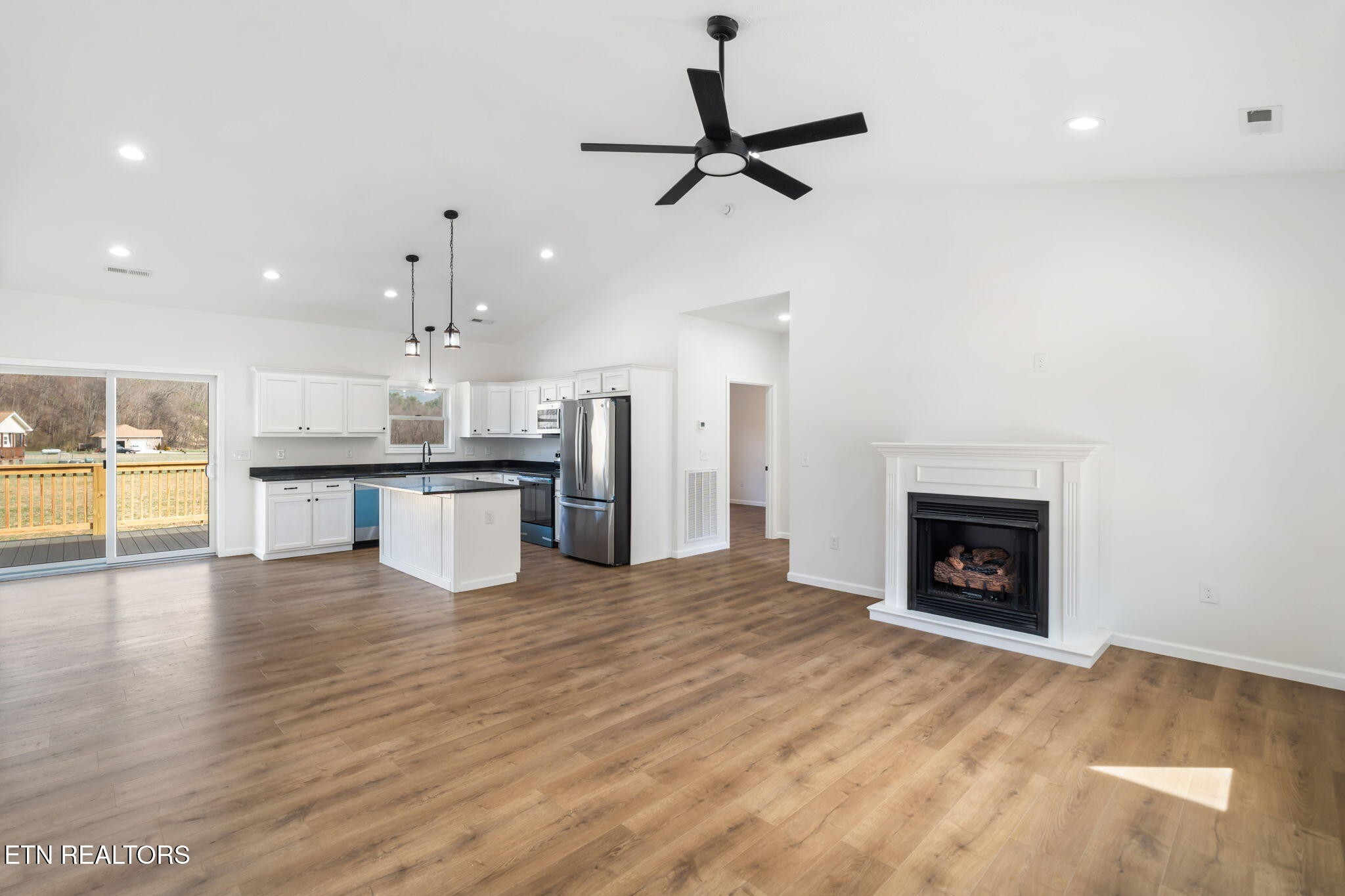 680 Kaylee Lane Del Rio, TN 37727 - Photo 9 of 41 a view of a kitchen with a sink and a fireplace