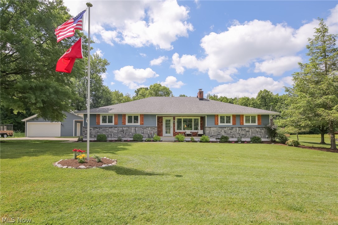 3362 Granger Road Medina, OH 44256 - Photo 1 of 49 Ranch-style home featuring an outdoor structure, a garage, and a front lawn