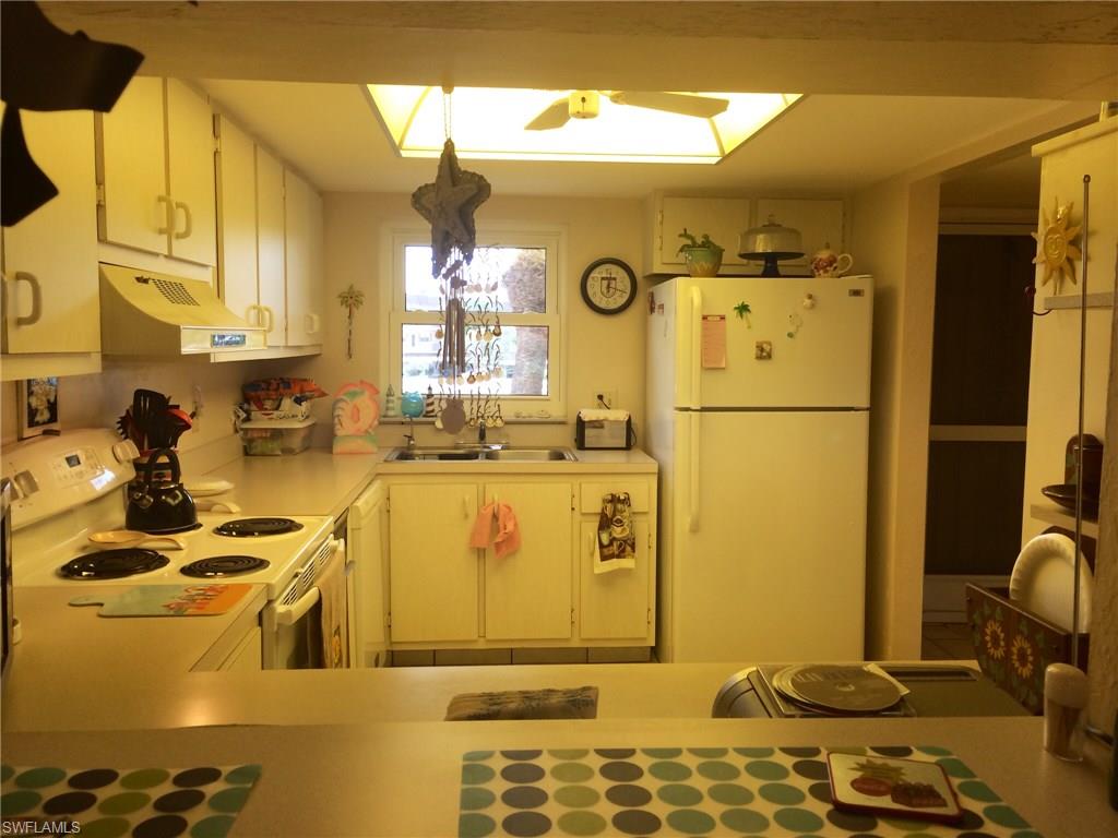 5590 Rattlesnake Hammock Road, Unit 202 Naples, FL 34113 - Photo 5 of 20 Gallery Image 5