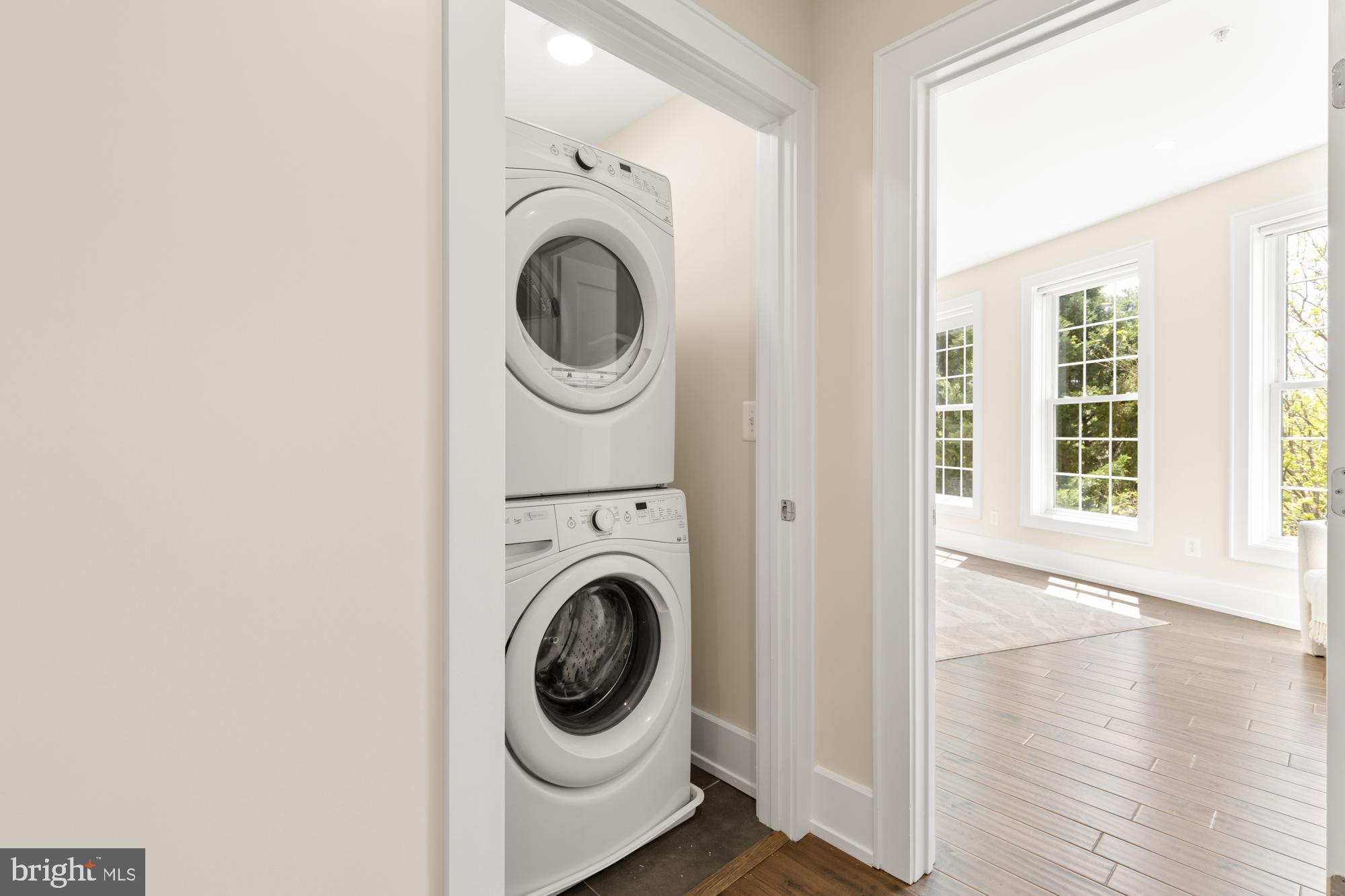 16 Grant Circle Northwest, Unit 2 Washington, DC 20011 - Photo 14 of 35 a view of a hallway with washer and dryer