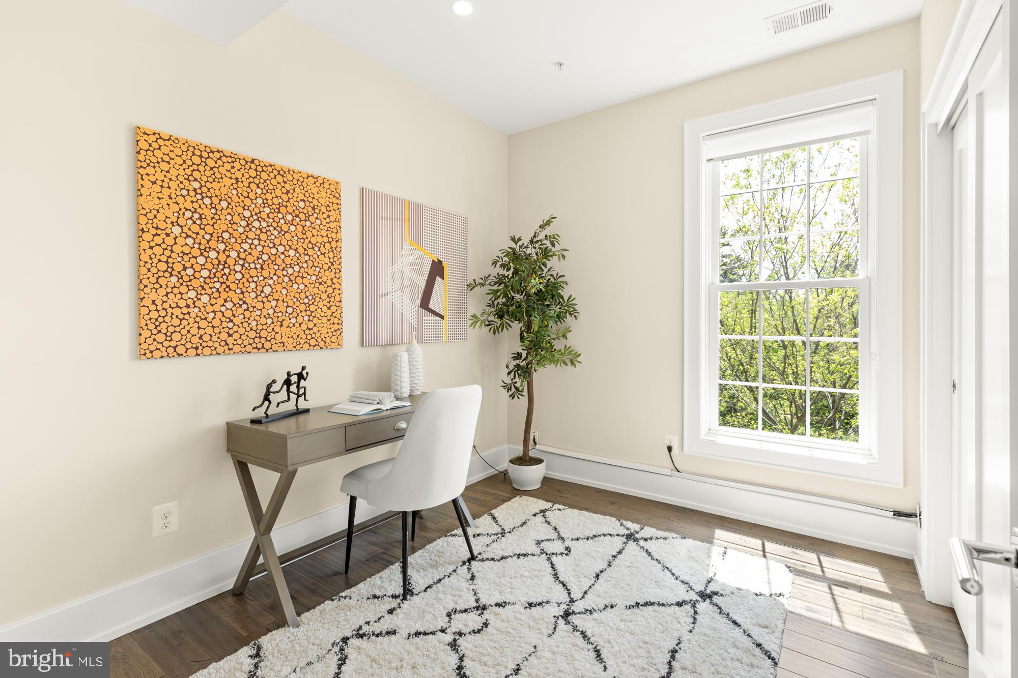 16 Grant Circle Northwest, Unit 2 Washington, DC 20011 - Photo 21 of 35 a living room with furniture and a window