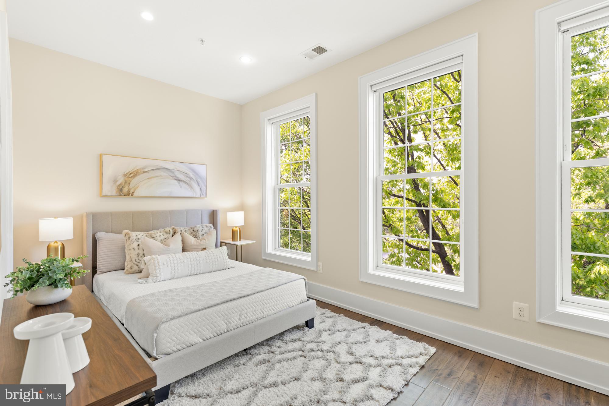 16 Grant Circle Northwest, Unit 2 Washington, DC 20011 - Photo 23 of 35 a bedroom with a bed and a window