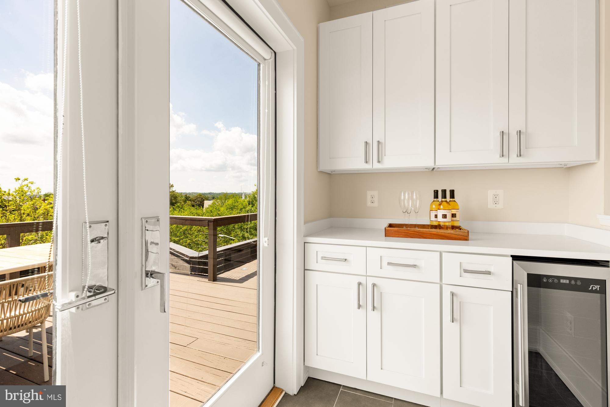 16 Grant Circle Northwest, Unit 2 Washington, DC 20011 - Photo 25 of 35 a kitchen with a white cabinets and a sink