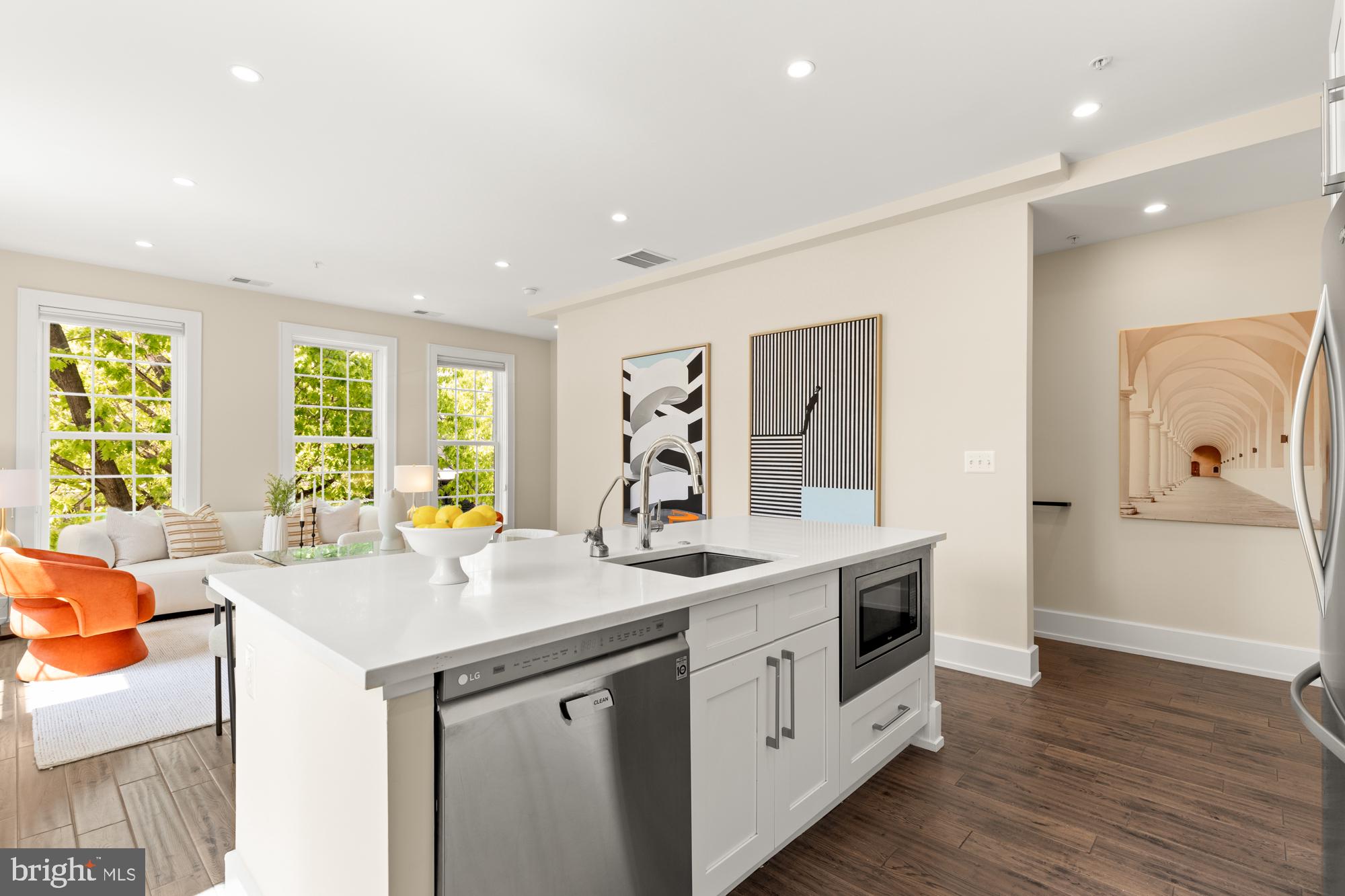 16 Grant Circle Northwest, Unit 2 Washington, DC 20011 - Photo 8 of 35 a kitchen with a sink stove and cabinets