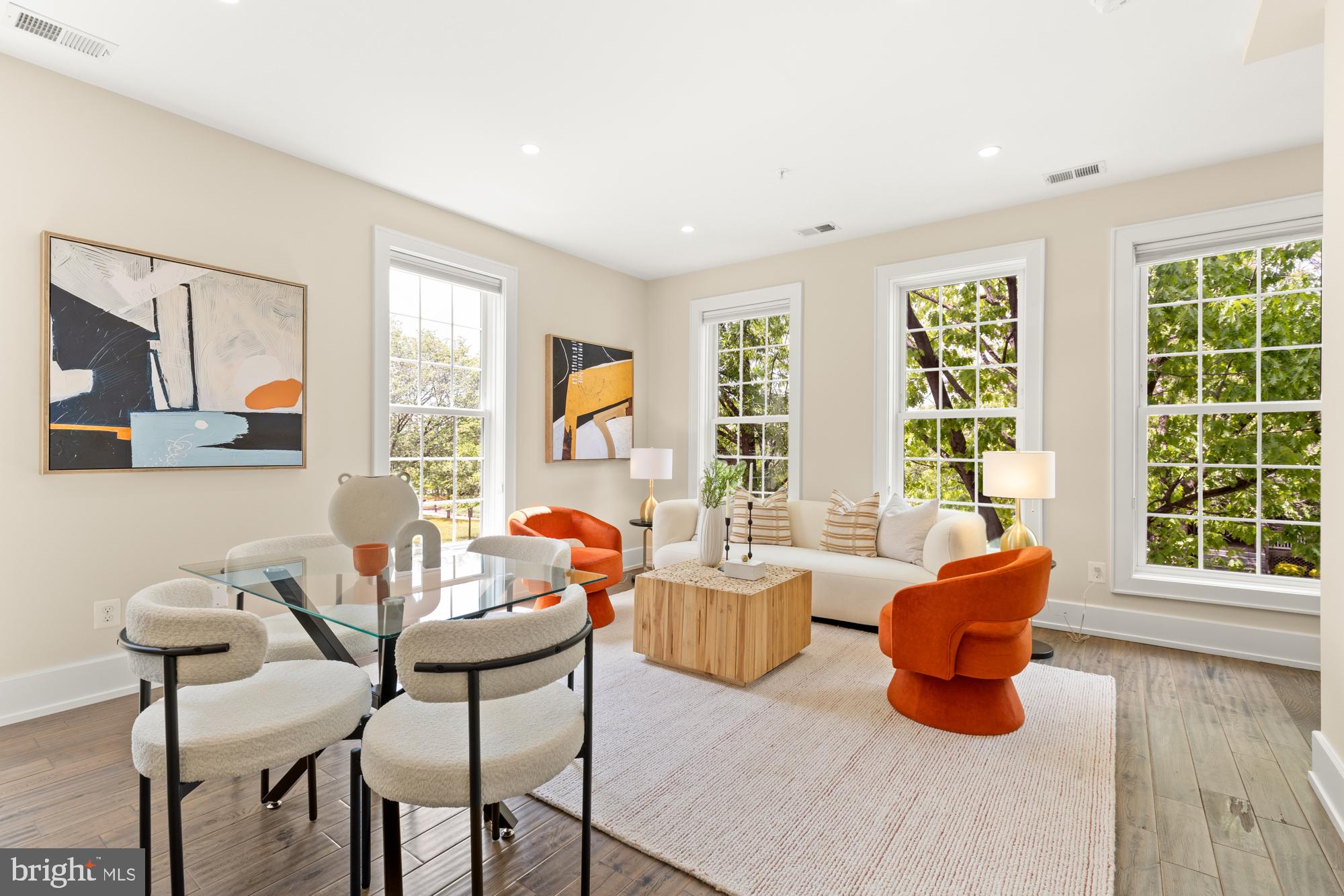 16 Grant Circle Northwest, Unit 2 Washington, DC 20011 - Photo 10 of 35 a living room with furniture and a large window