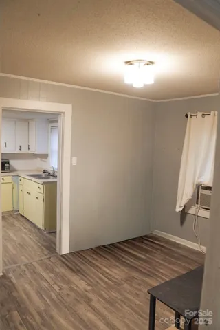 a view of kitchen and sink