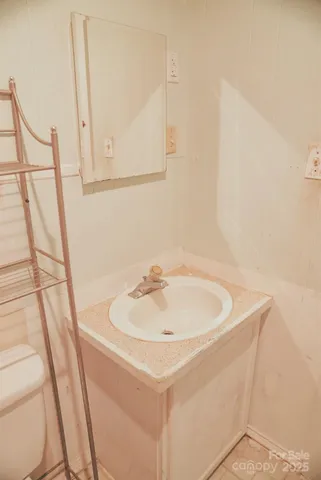 a bathroom with a sink and a bathtub