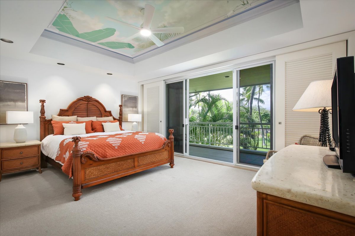 68-1375 Pauoa Road, Unit D4 Kamuela, HI 96743 - Photo 15 of 30 a bedroom with a bed and large windows