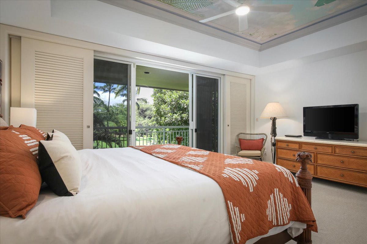 68-1375 Pauoa Road, Unit D4 Kamuela, HI 96743 - Photo 16 of 30 a bedroom with bed tv and window