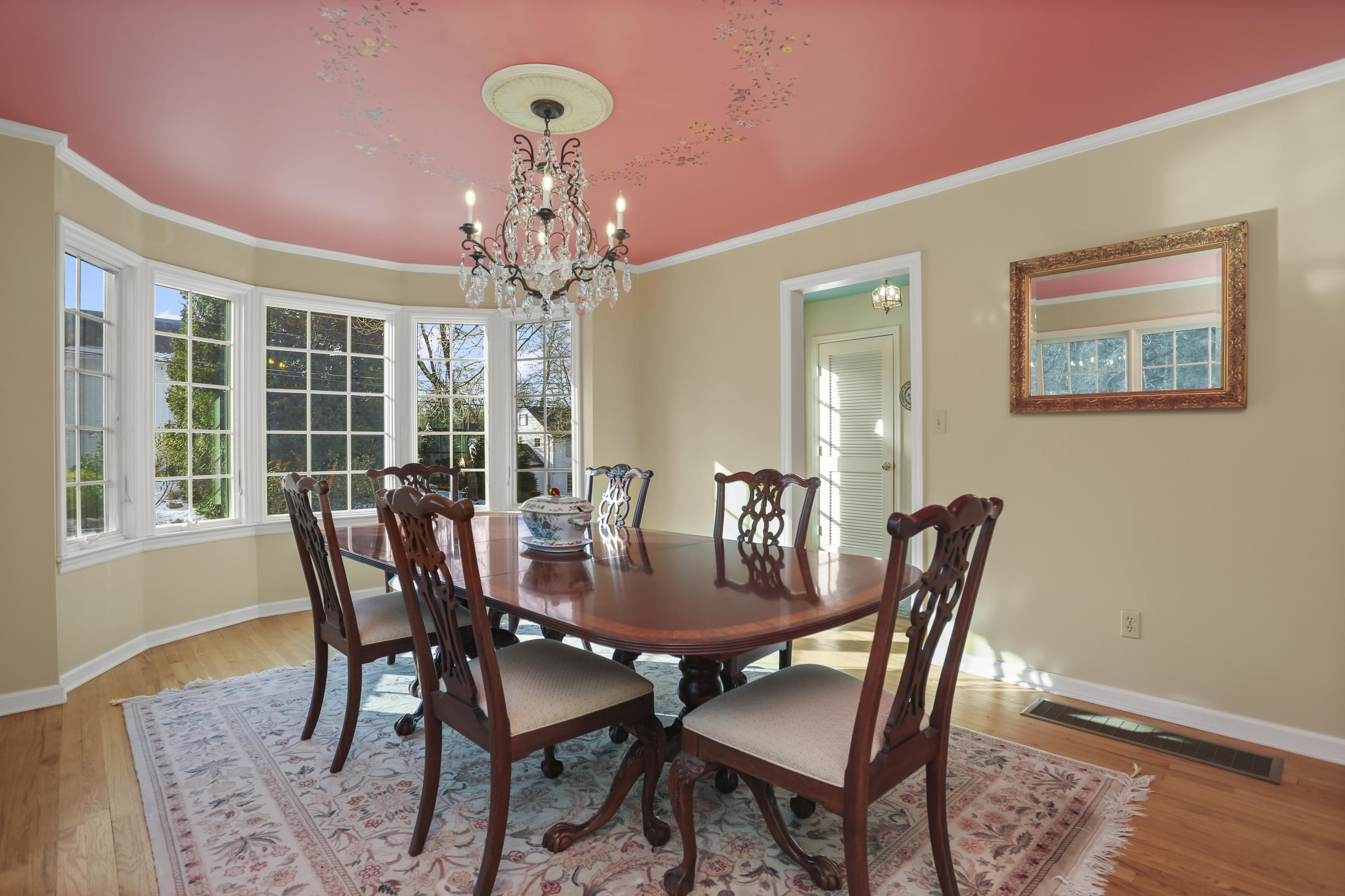 6 Echo Drive Darien, CT 06820 - Photo 12 of 37 a view of a dining room with furniture window and wooden floor