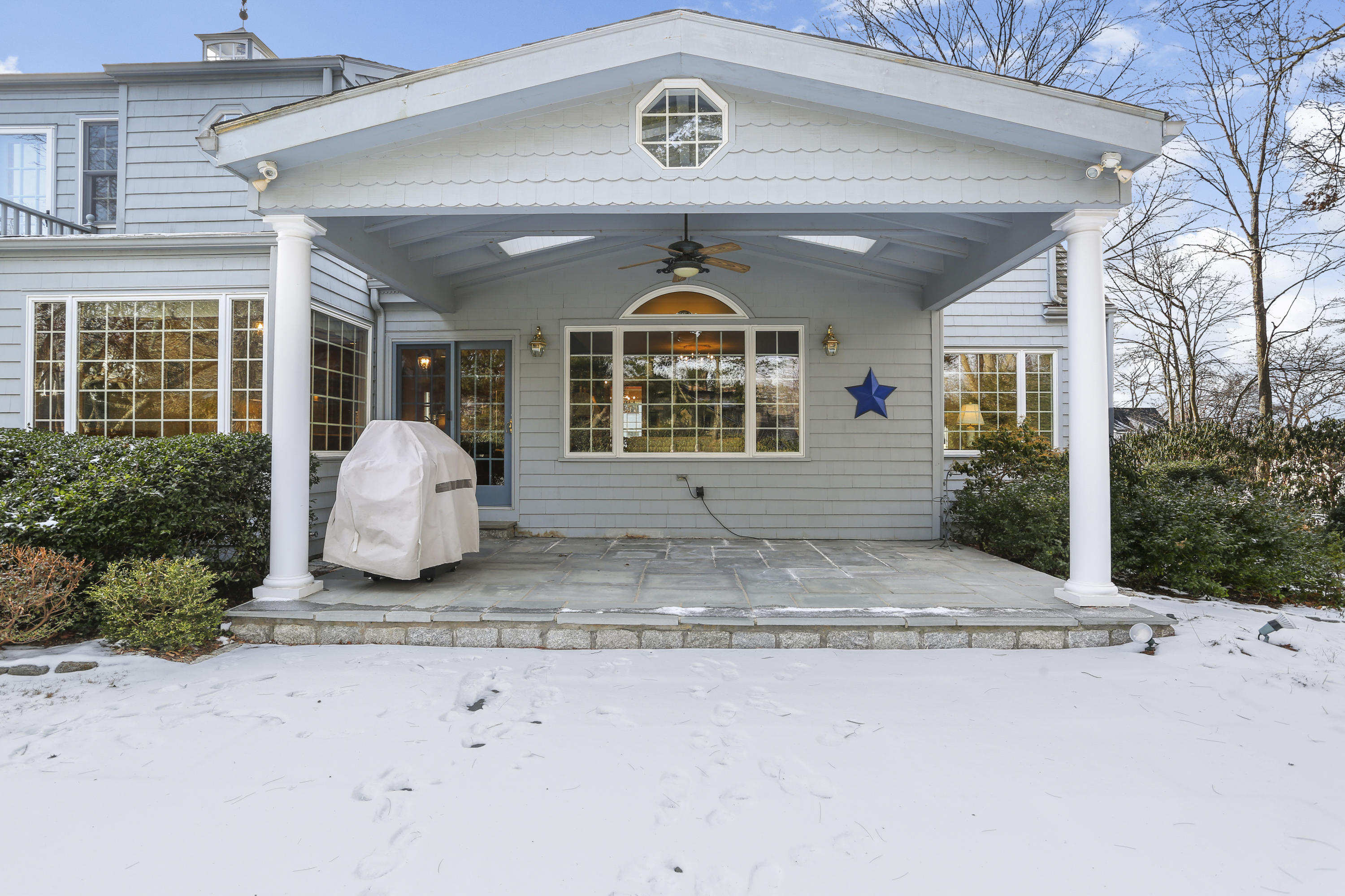 6 Echo Drive Darien, CT 06820 - Photo 26 of 37 a front view of a house with garden