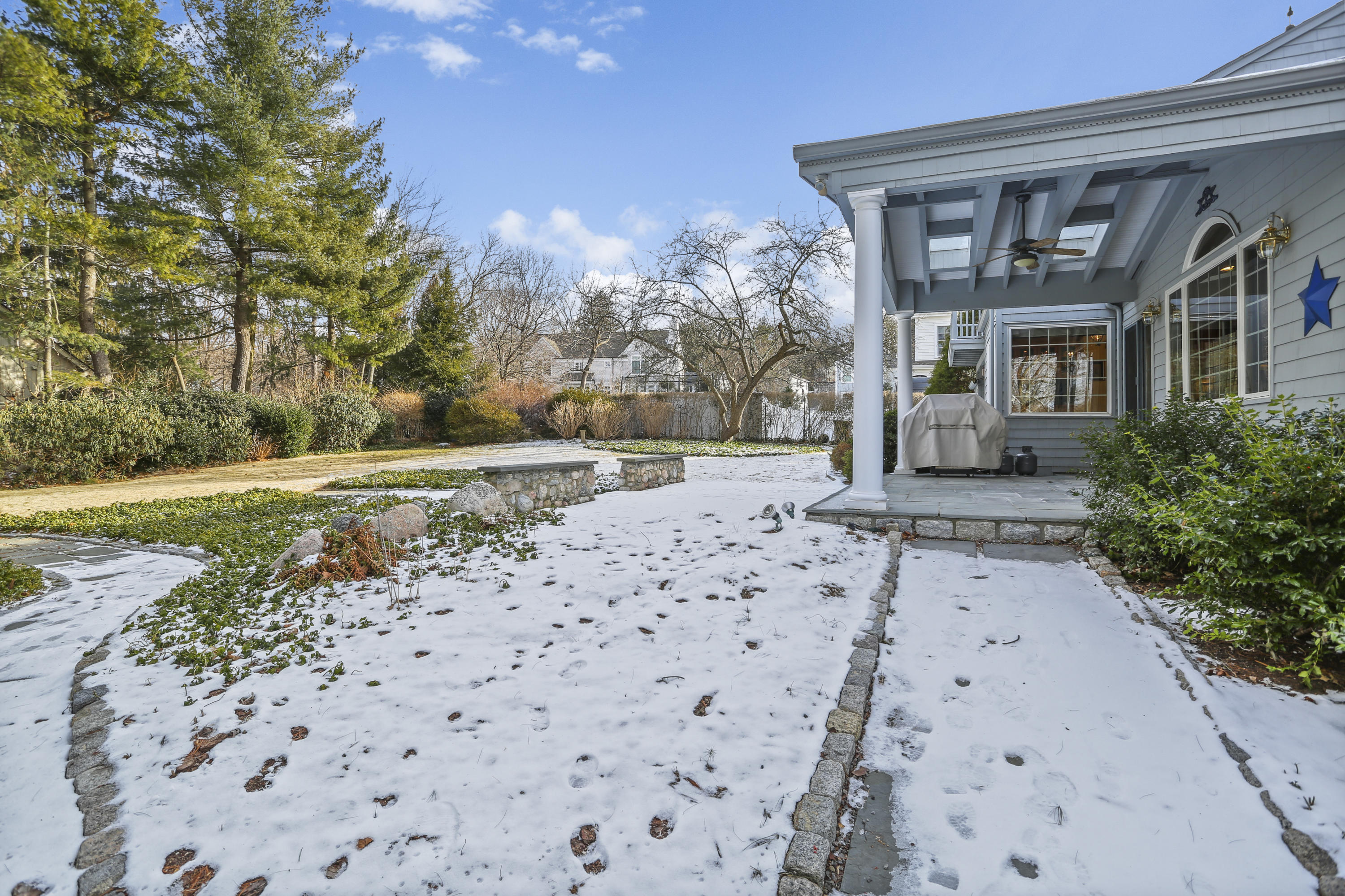 6 Echo Drive Darien, CT 06820 - Photo 28 of 37 a front view of a house with a yard