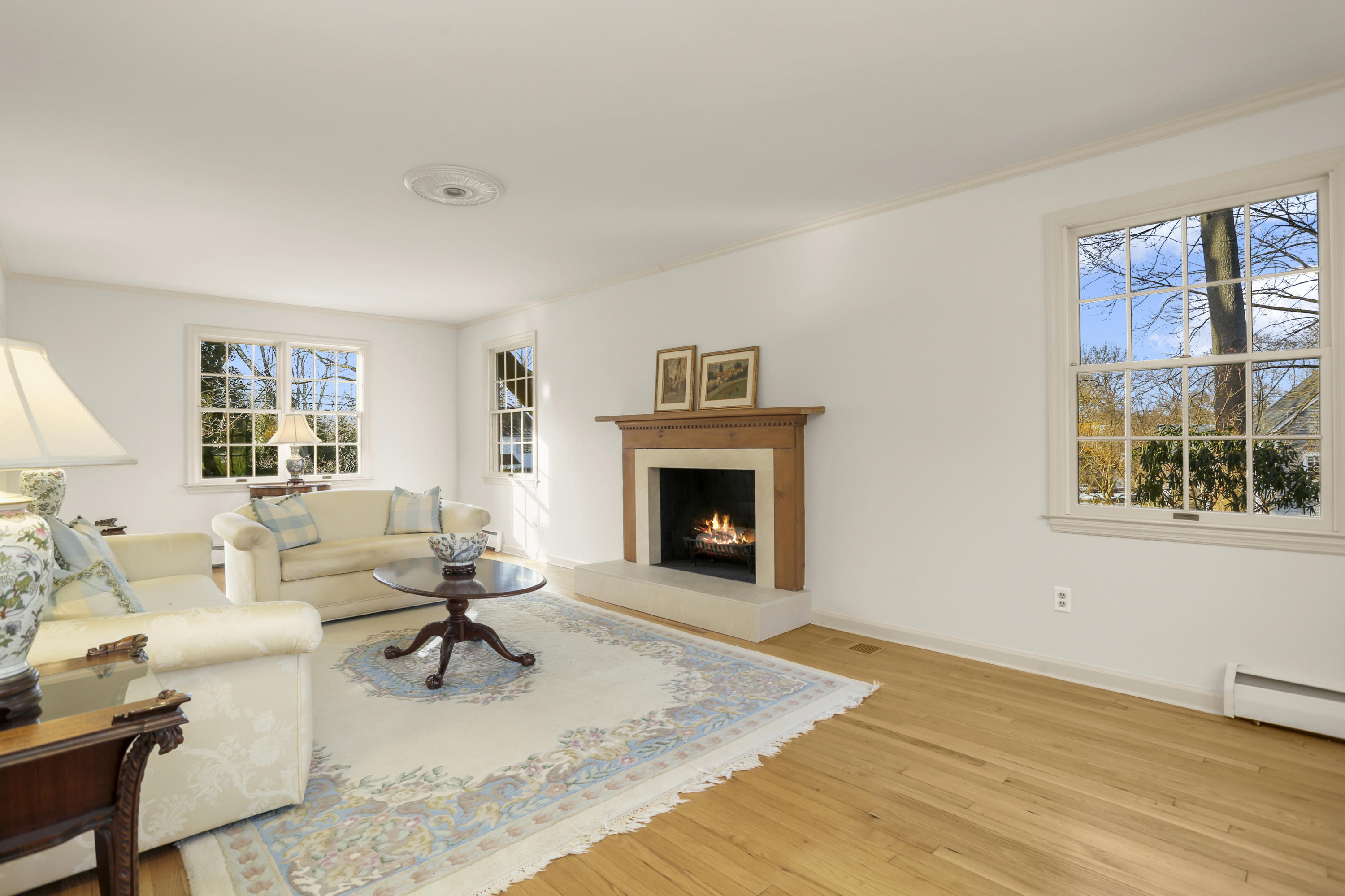 6 Echo Drive Darien, CT 06820 - Photo 4 of 37 a living room with furniture and a fireplace