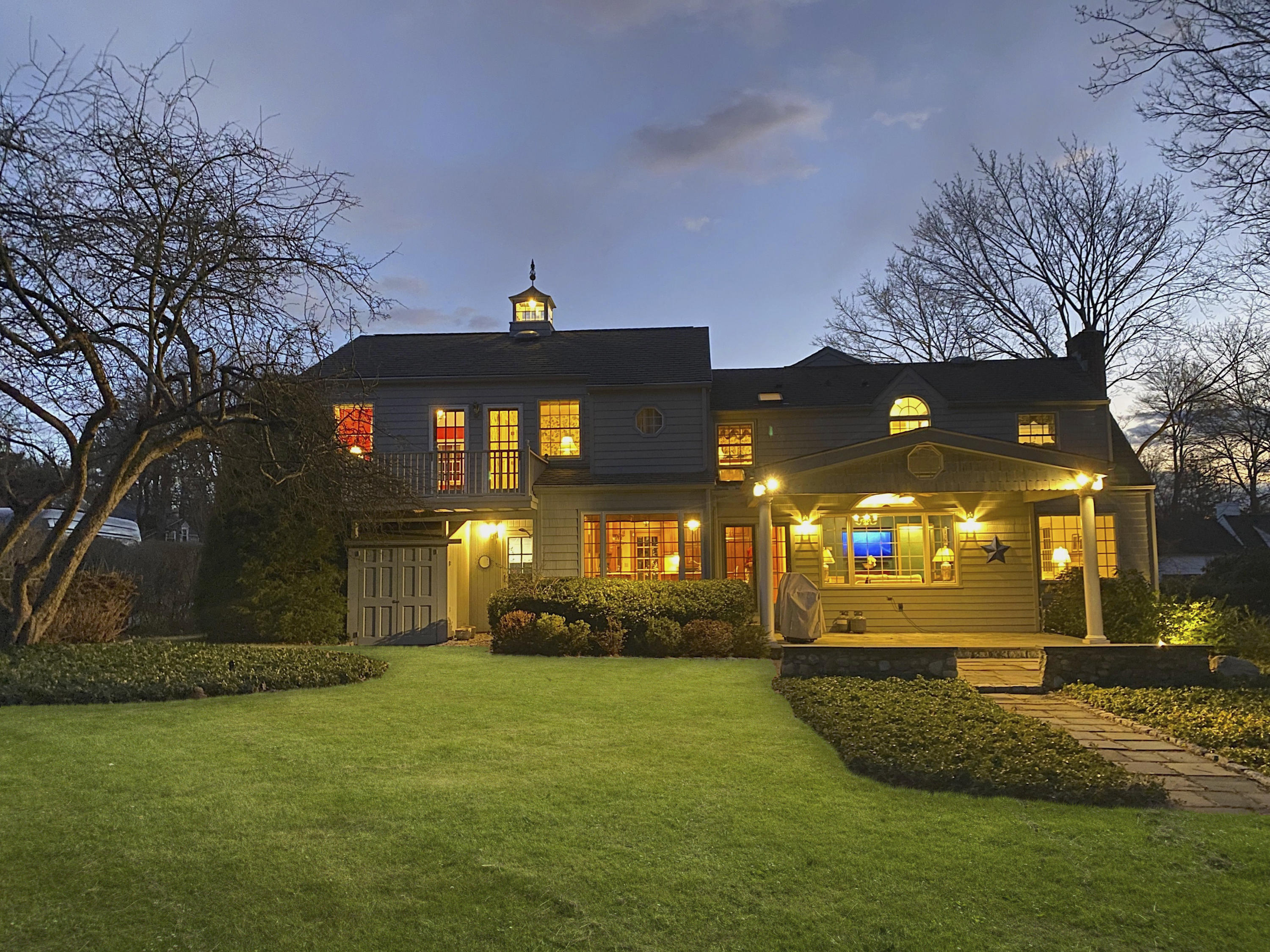 6 Echo Drive Darien, CT 06820 - Photo 33 of 37 a front view of a house with a yard