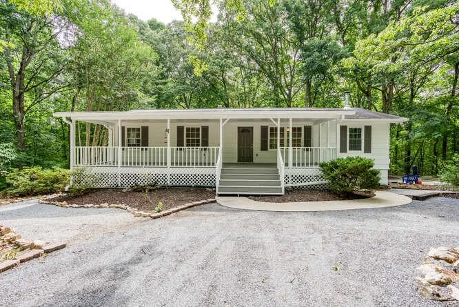 front view of a house with a yard