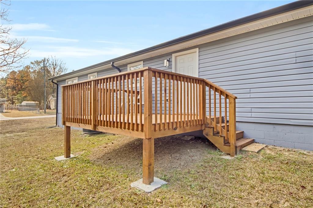 24 Echo Ridge Drive Powder Springs, GA 30127 - Photo 16 of 28 a view of a porch with a sink