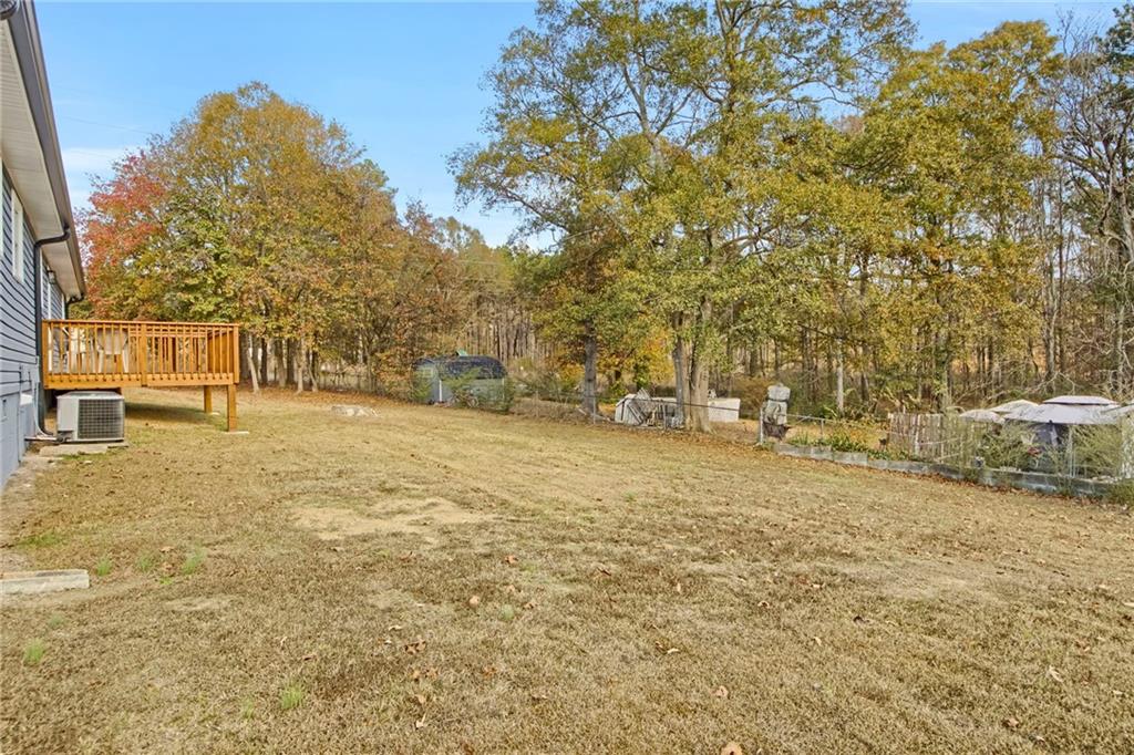 24 Echo Ridge Drive Powder Springs, GA 30127 - Photo 28 of 28 a view of yard with trees