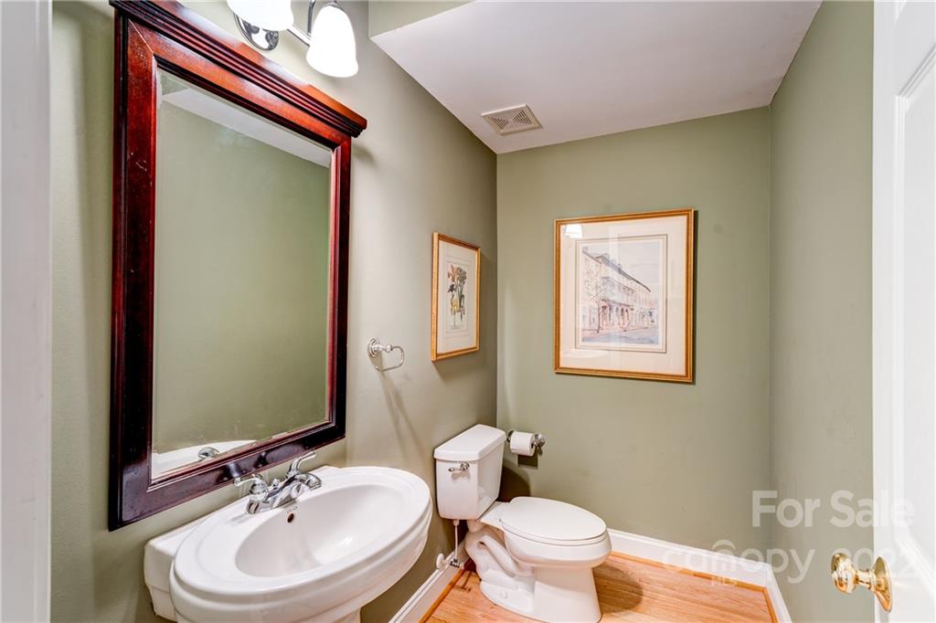 1944 Clark Elliot Street Fort Mill, SC 29708 - Photo 18 of 46 a bathroom with a sink and a mirror