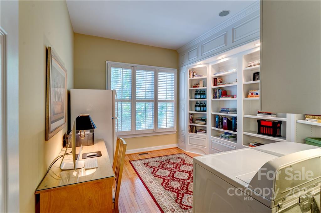 1944 Clark Elliot Street Fort Mill, SC 29708 - Photo 19 of 46 a room with furniture a flat screen tv and a table