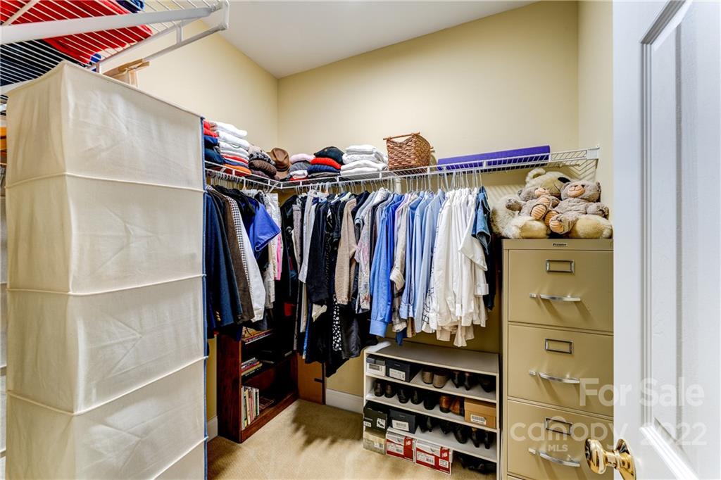 1944 Clark Elliot Street Fort Mill, SC 29708 - Photo 29 of 46 a view of walk in closet with clothes