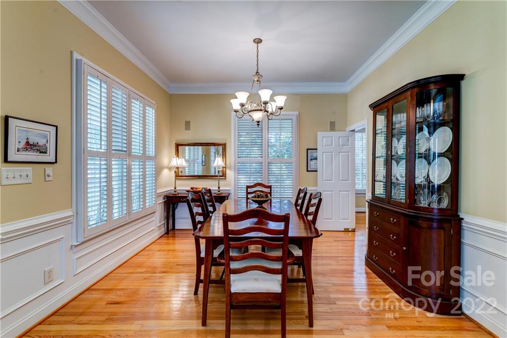 1944 Clark Elliot Street Fort Mill, SC 29708 - Photo 8 of 46 a view of a dining room with furniture window and wooden floor