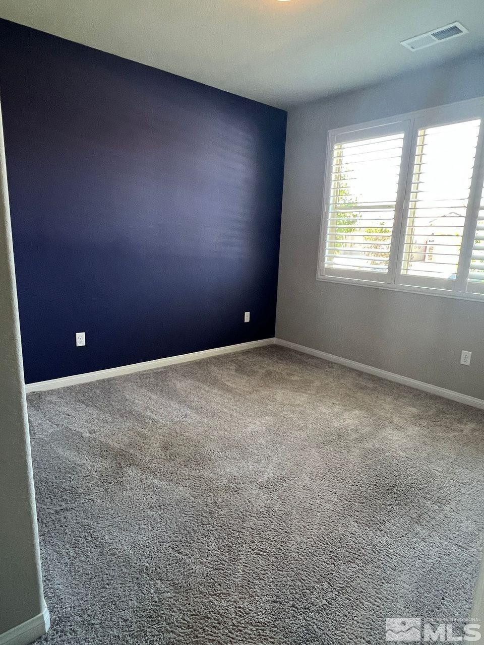 774 Sweet Briar Lane Sparks, NV 89436 - Photo 13 of 17 an empty room with windows