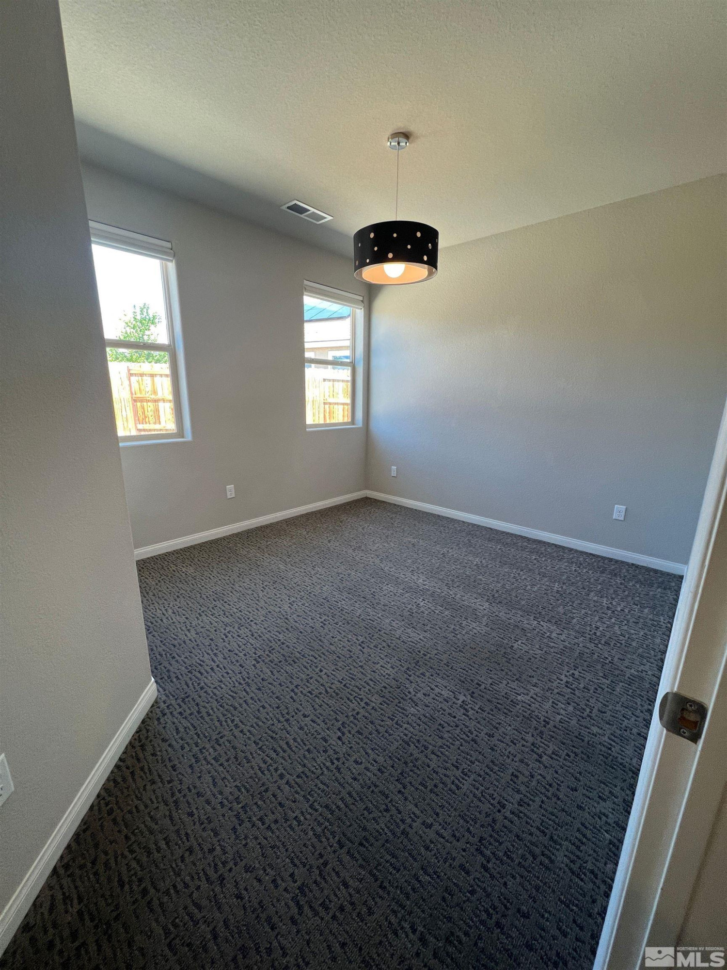 774 Sweet Briar Lane Sparks, NV 89436 - Photo 14 of 17 an empty room with windows and entrance