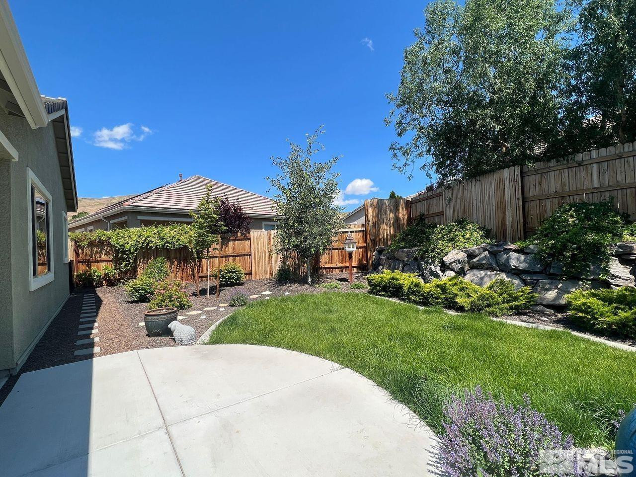 774 Sweet Briar Lane Sparks, NV 89436 - Photo 17 of 17 a garden view with a seating space