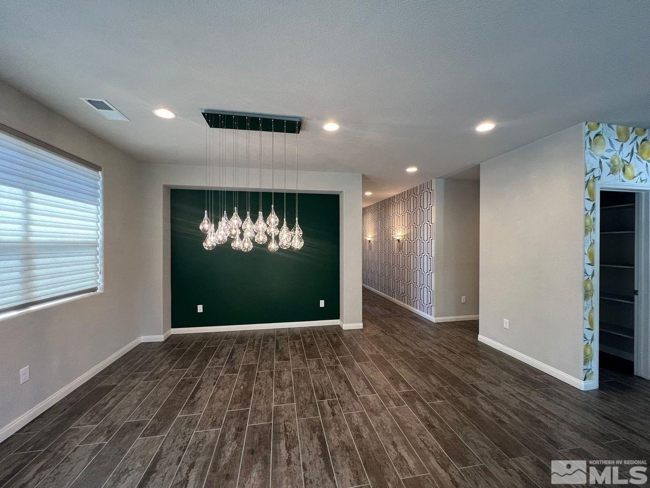 774 Sweet Briar Lane Sparks, NV 89436 - Photo 5 of 17 wooden floor in an empty room with a window