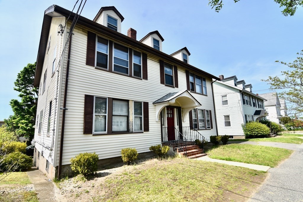 20 Hollis Avenue, Unit 5 Quincy, MA 02171 - Photo 13 of 14 a front view of a house with garden