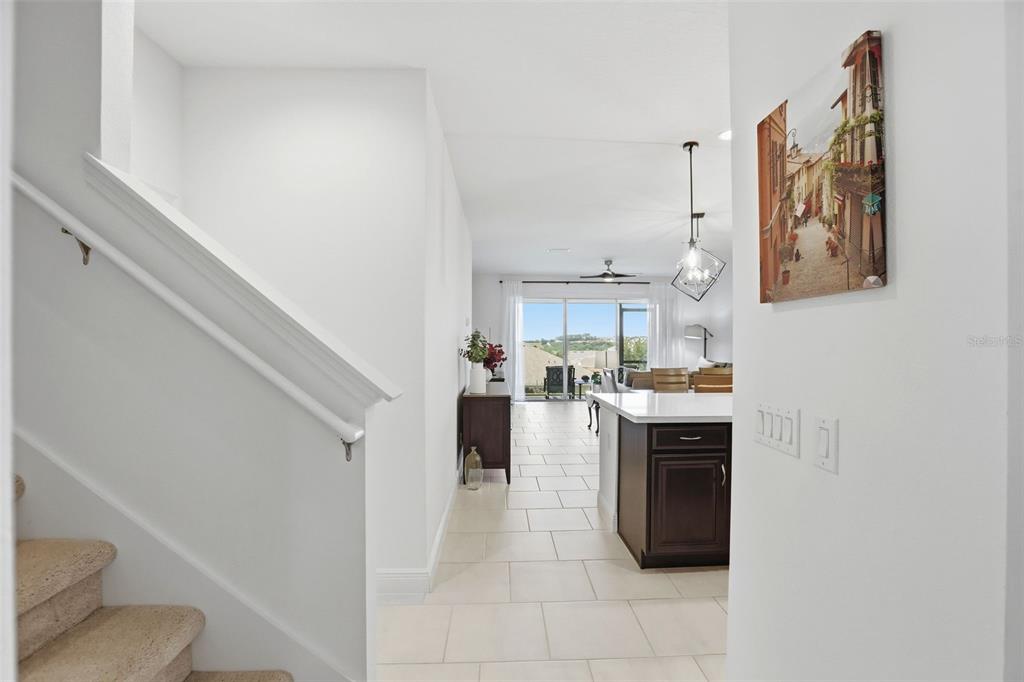 1433 Shira Road Minneola, FL 34715 - Photo 12 of 40 a view of a kitchen and an entryway