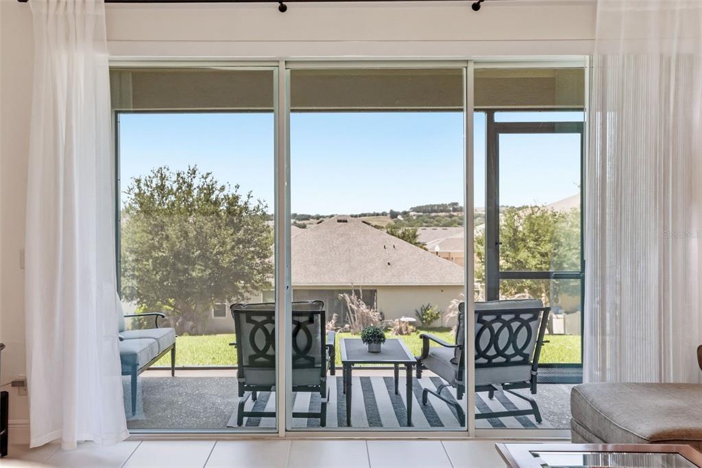 1433 Shira Road Minneola, FL 34715 - Photo 14 of 40 a view of a outdoor space with seating area