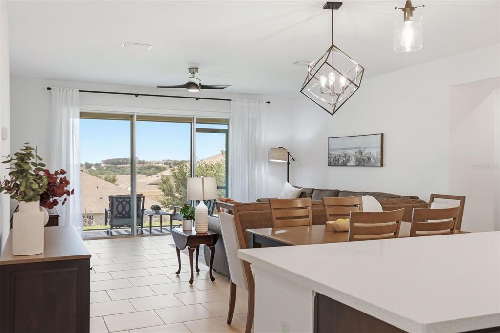 1433 Shira Road Minneola, FL 34715 - Photo 4 of 40 a view of a dining room with furniture window and outside view