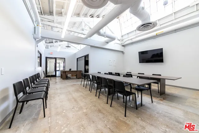 a view of a water heater room with a garage