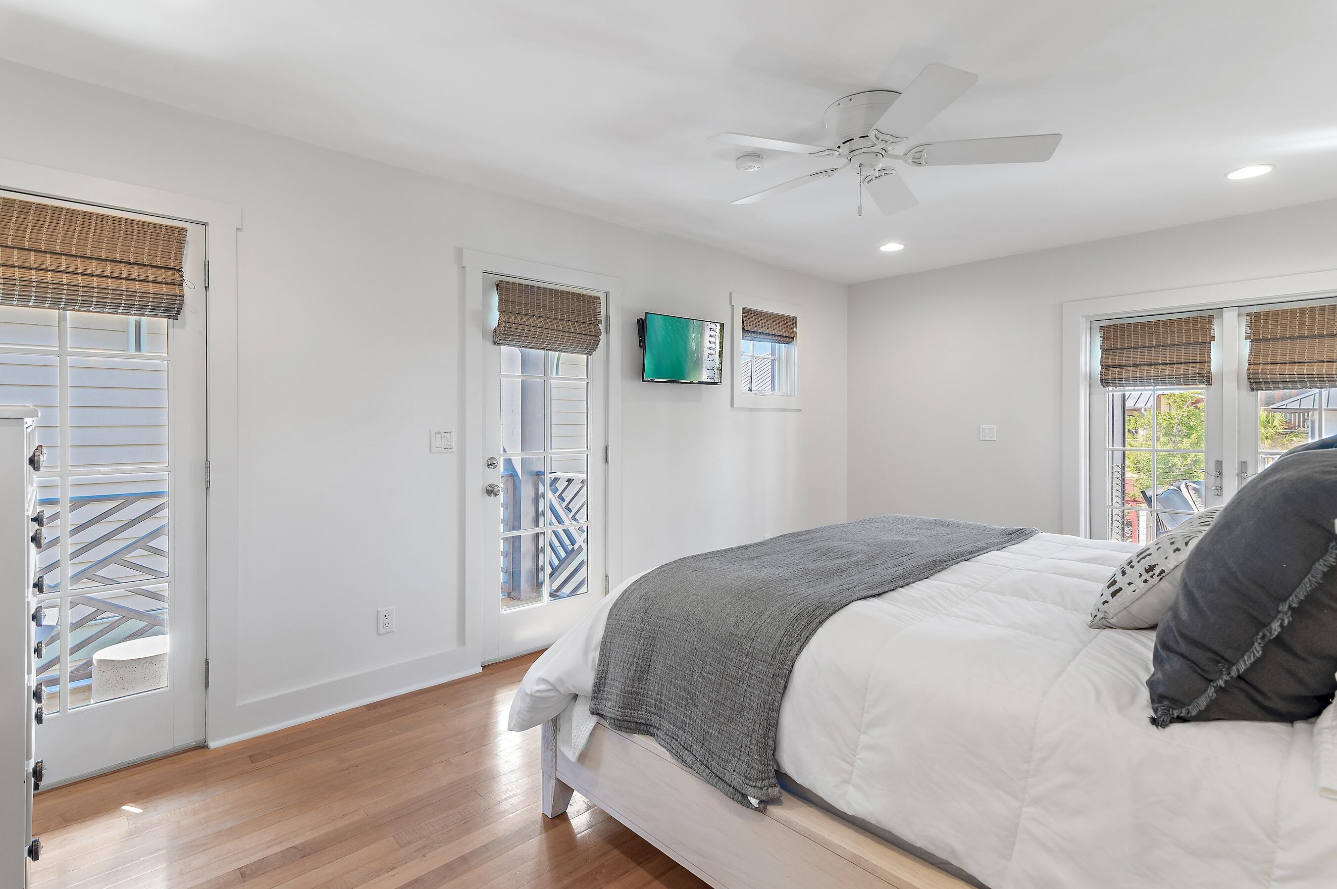 182 Kingston Road Inlet Beach, FL 32461 - Photo 21 of 55 a bedroom with a large bed and a window