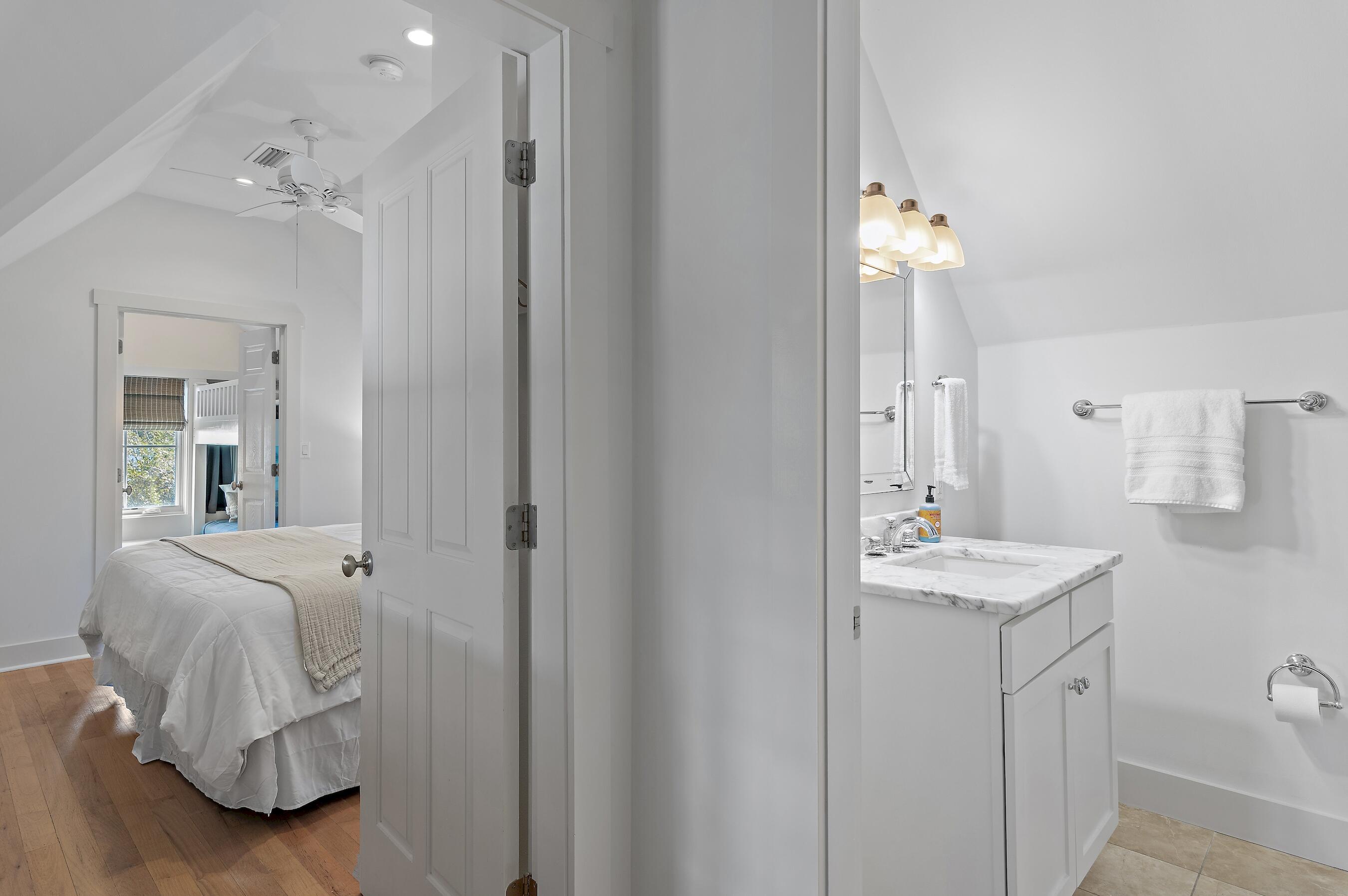 182 Kingston Road Inlet Beach, FL 32461 - Photo 29 of 55 a bathroom with a sink and mirror with shower
